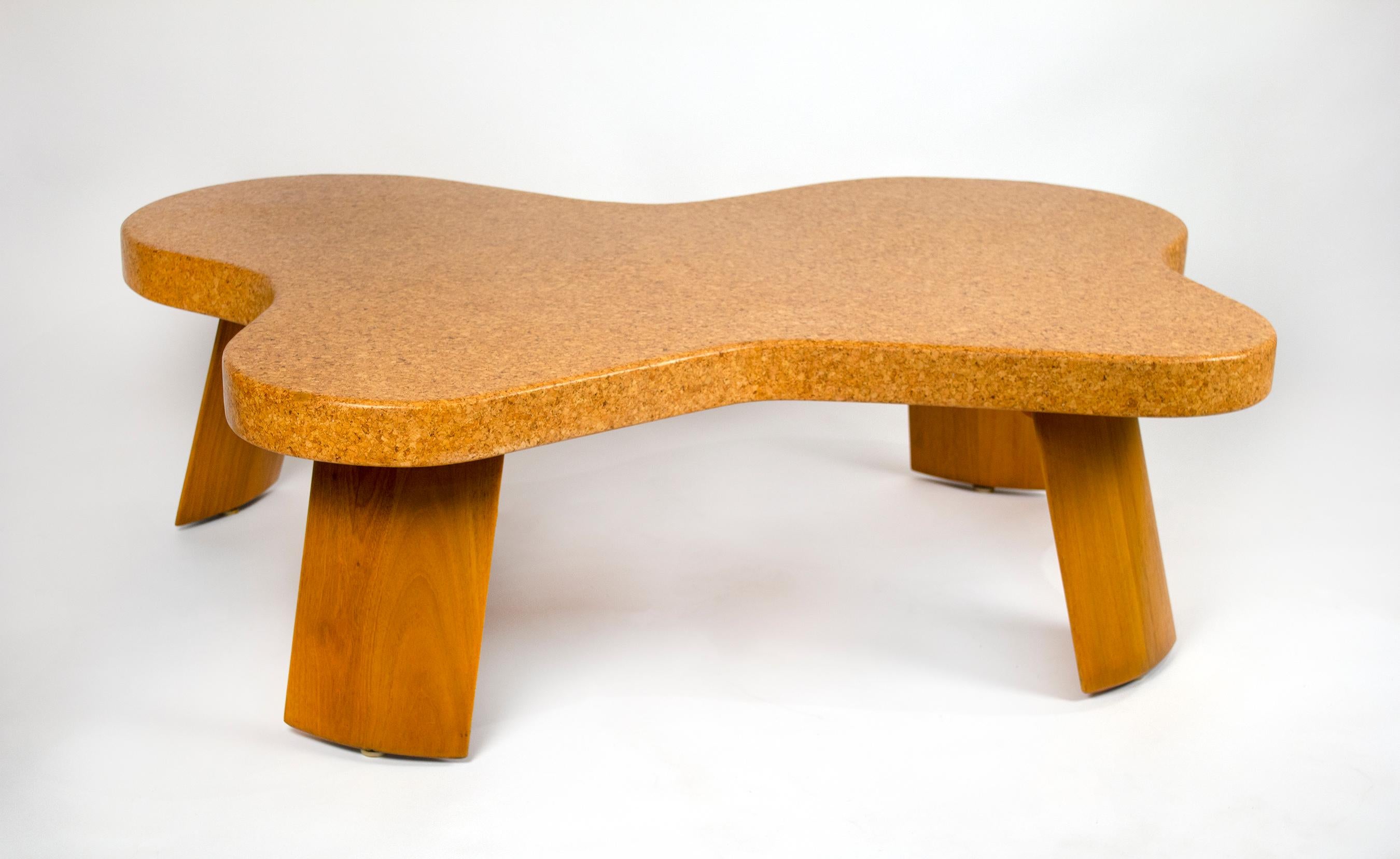 Iconic, early cloud coffee table model 5005 designed by Paul Frankl for Johnson Furniture Company 1951. The table is in very good condition with a natural waxed cork top and bleached mahogany legs. This is the rarest configuration of this table.
