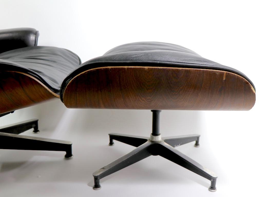 20th Century Iconic Eames Lounge Chair and Ottoman in Rosewood