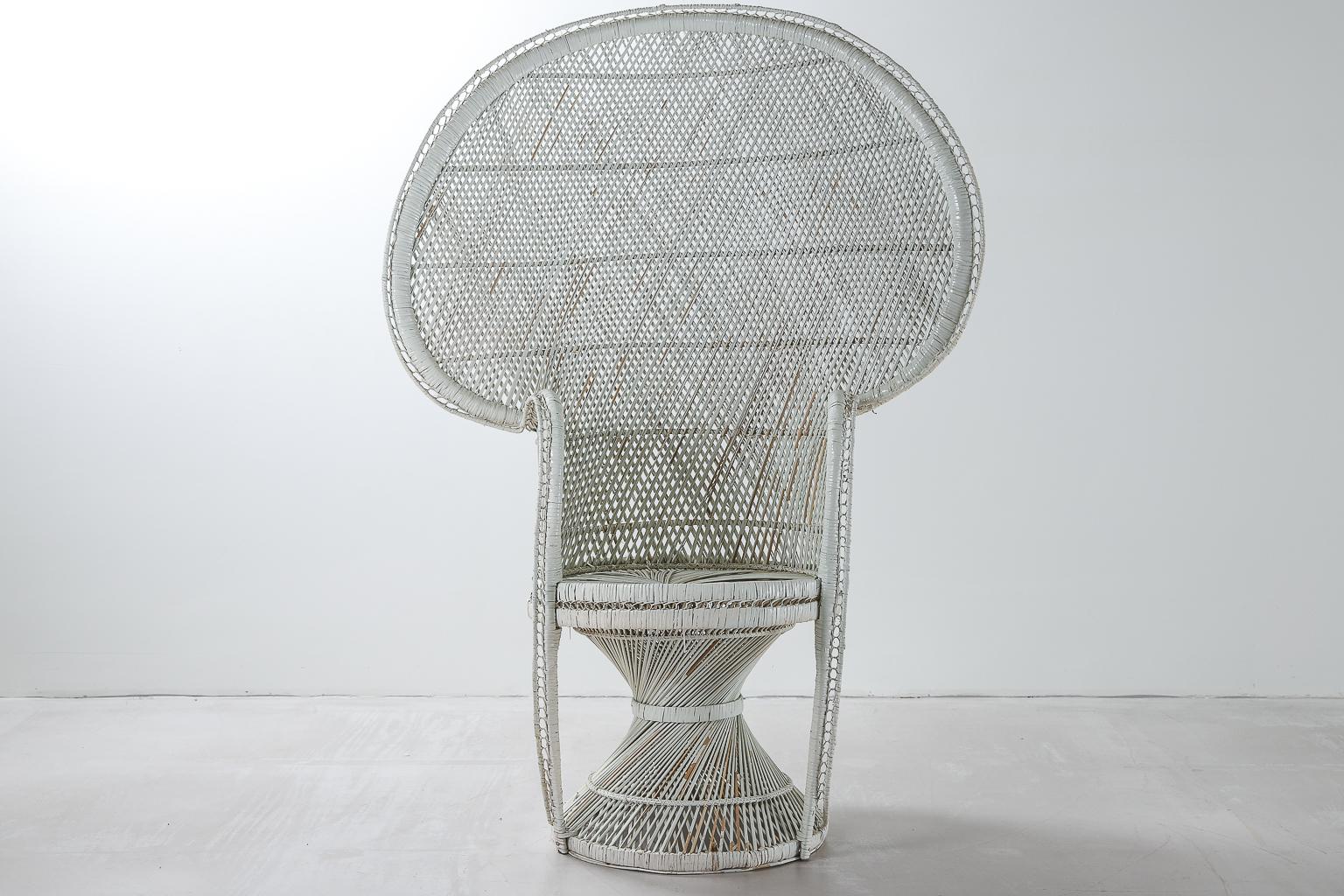 Wicker peacock chair in the style of the iconic Emmanuelle chair.

White twist base wicker peacock chair with a dramatic, chic and stylish design, Classic period form.

  