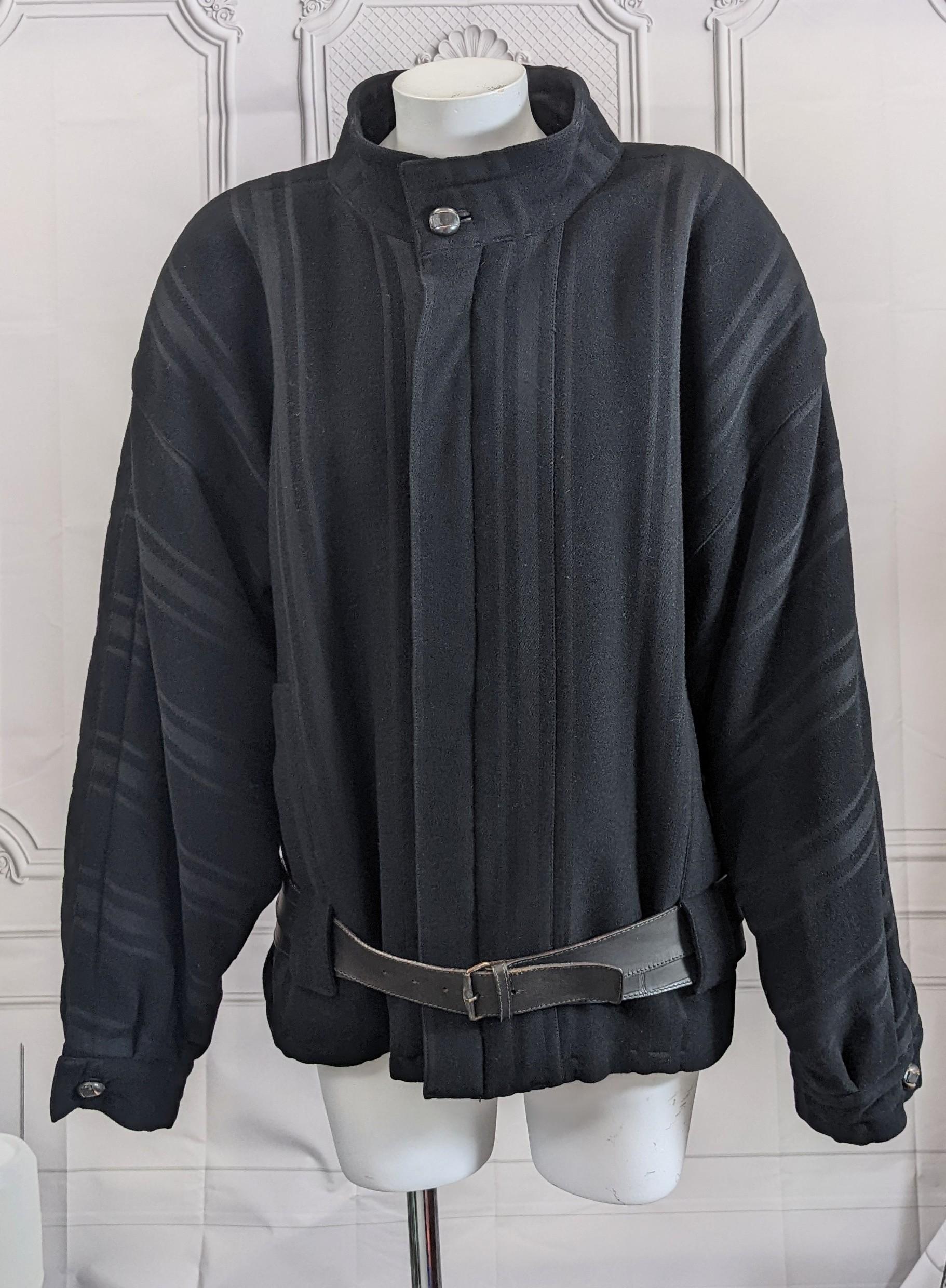 Iconic Gianni Versace Mens Bomber from the 1980's. Striped Charcoal Gray Wool cut with deep dolman sleeves and attached leather belt of smooth and faux alligator grains. Copper toned metal buttons and buckle trimmed in leather. Slashed pockets turn
