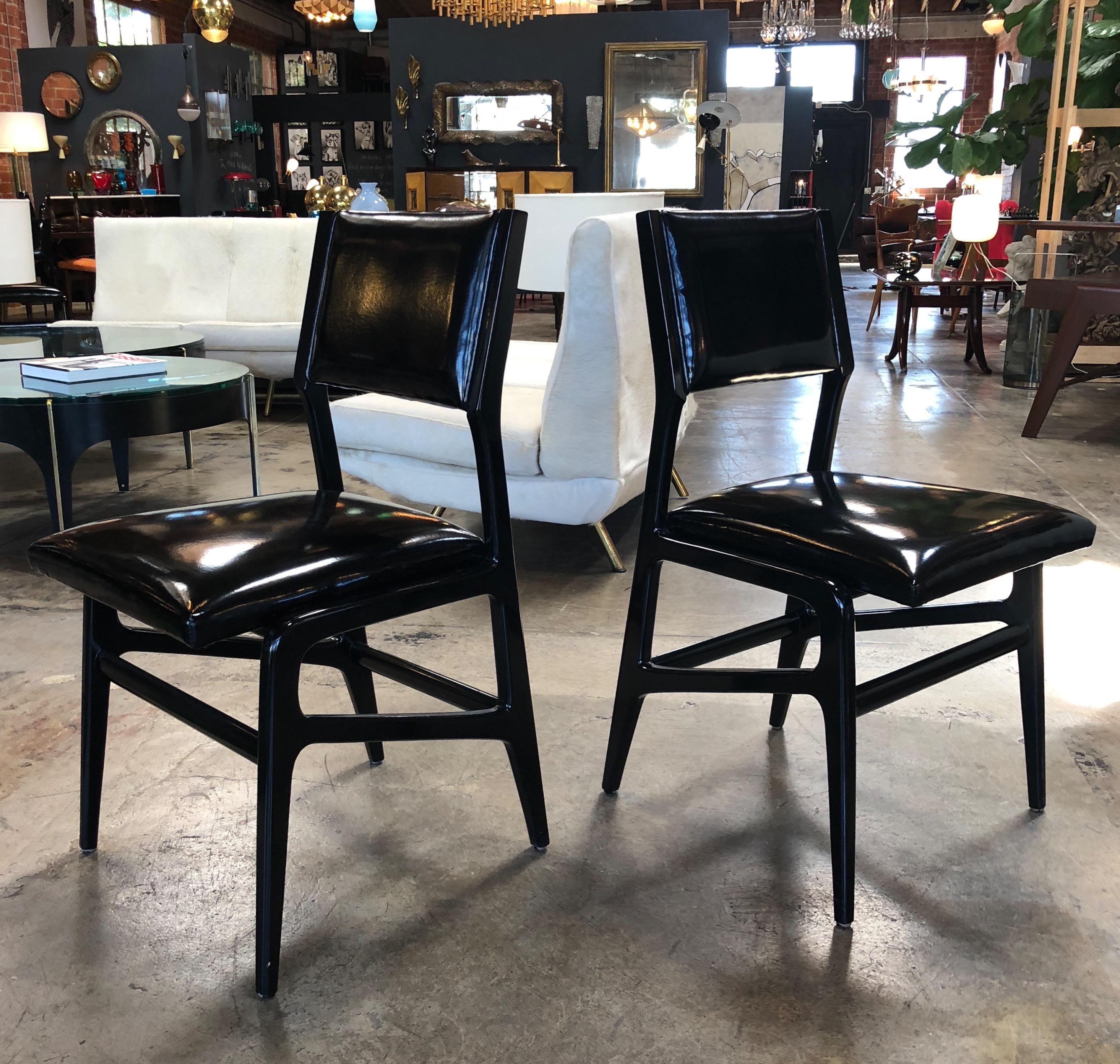 Pair of iconic Gio Ponti dining chairs.
Beautifully designed; item restored and ready to be shipped to you.