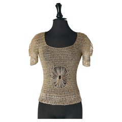 Iconic gold and silver lurex knit sweater with metallic chains Loris Azzaro 