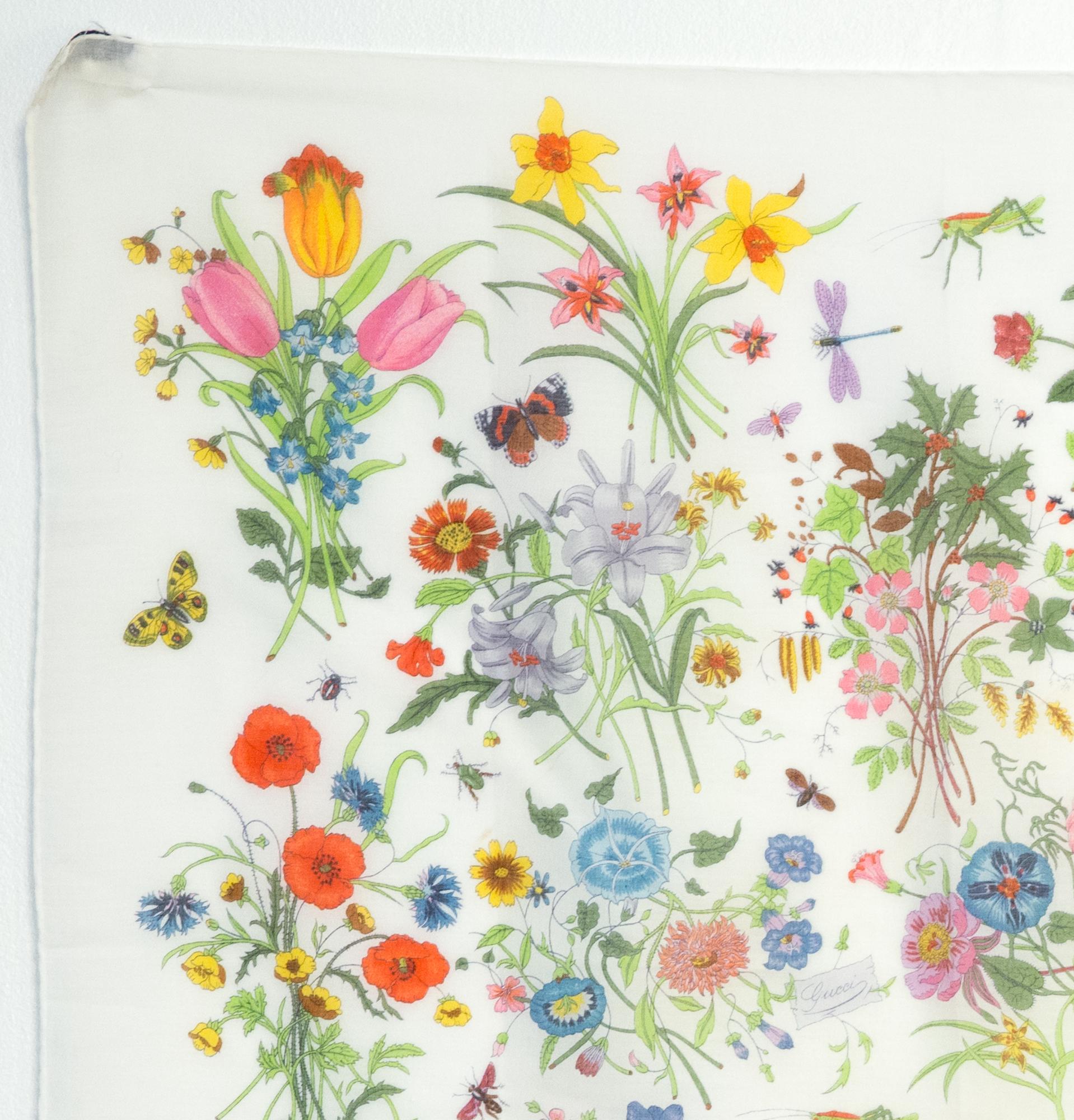 Gucci printed cotton scarf featuring the famous and emblematic Accornero floral print, and a Gucci signature.
In good vintage condition. Made in Italy
26,7in. (68cm) X 26,7in. (68cm)
The print was created in 1965 when Rodolfo Gucci commissioned