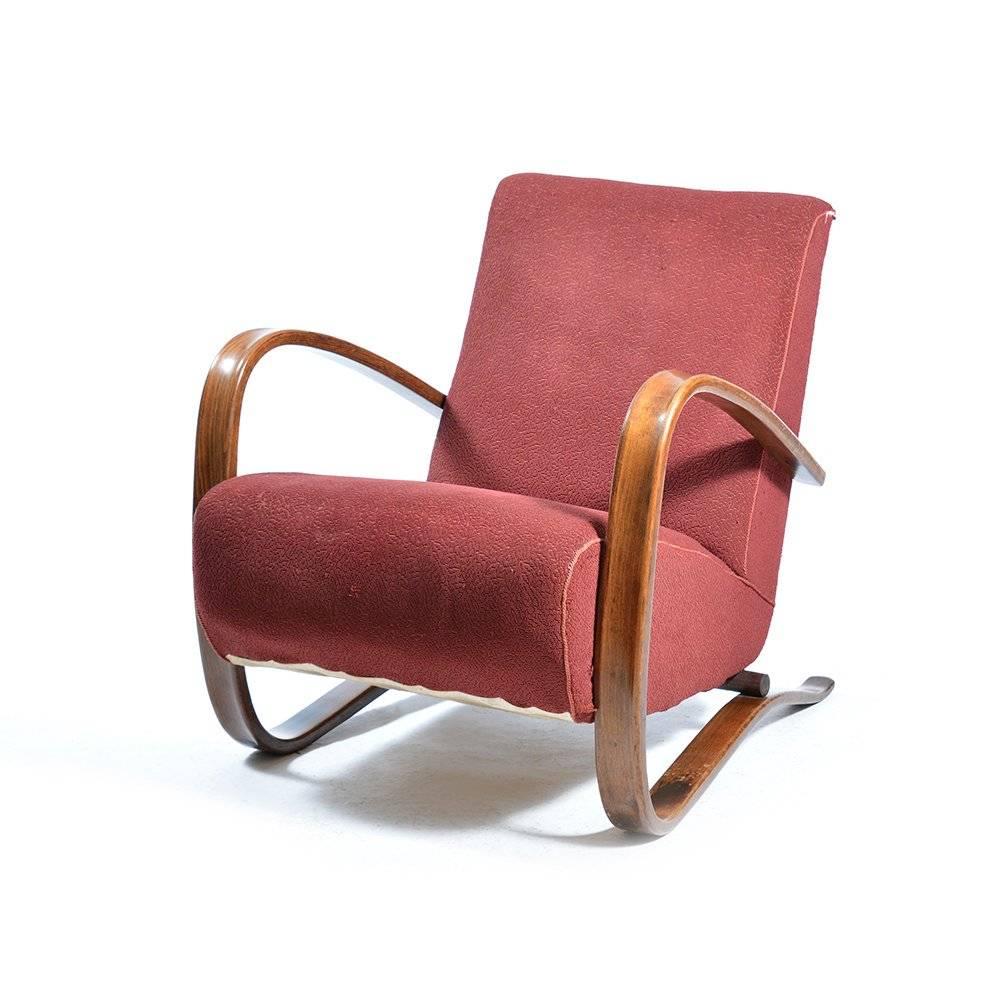 Iconic H-269 chair by Jindrich Halabala in very good, original condition. Produced in 1930s by UP Zavody in Czechoslovakia. Even after 80 years this armchair shows only minor wear on the original upholstery. Some typical patina visible on the wooden