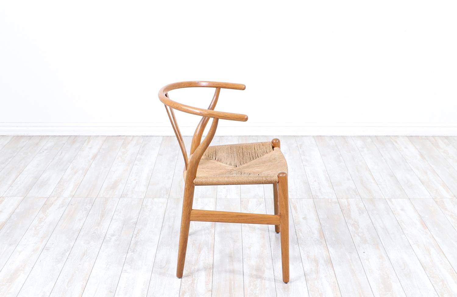 Danish Iconic Hans J. Wegner “Wishbone” Oak Arm Chair for Carl Hansen & Søn For Sale
