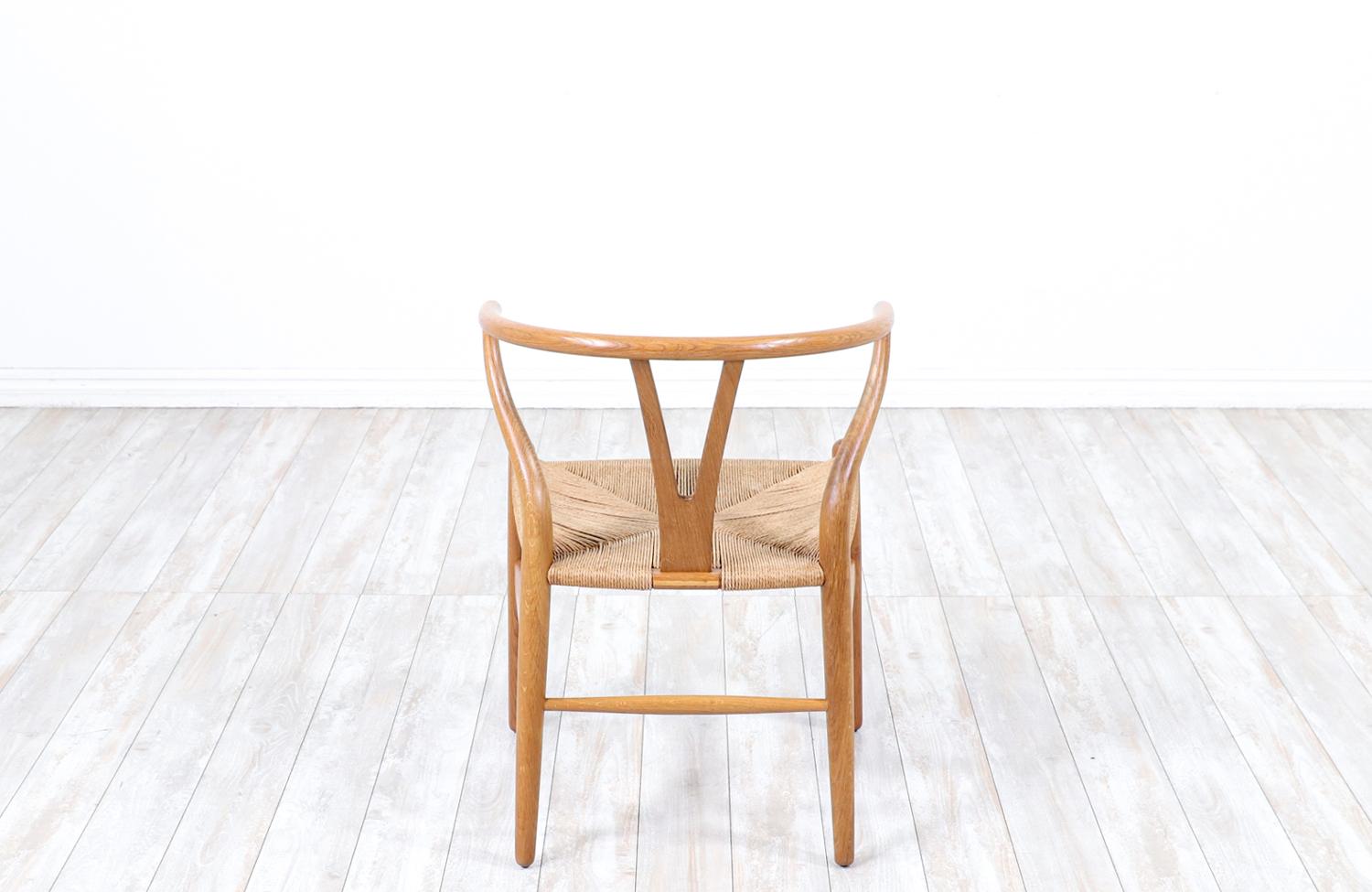 Mid-20th Century Iconic Hans J. Wegner “Wishbone” Oak Arm Chair for Carl Hansen & Søn For Sale