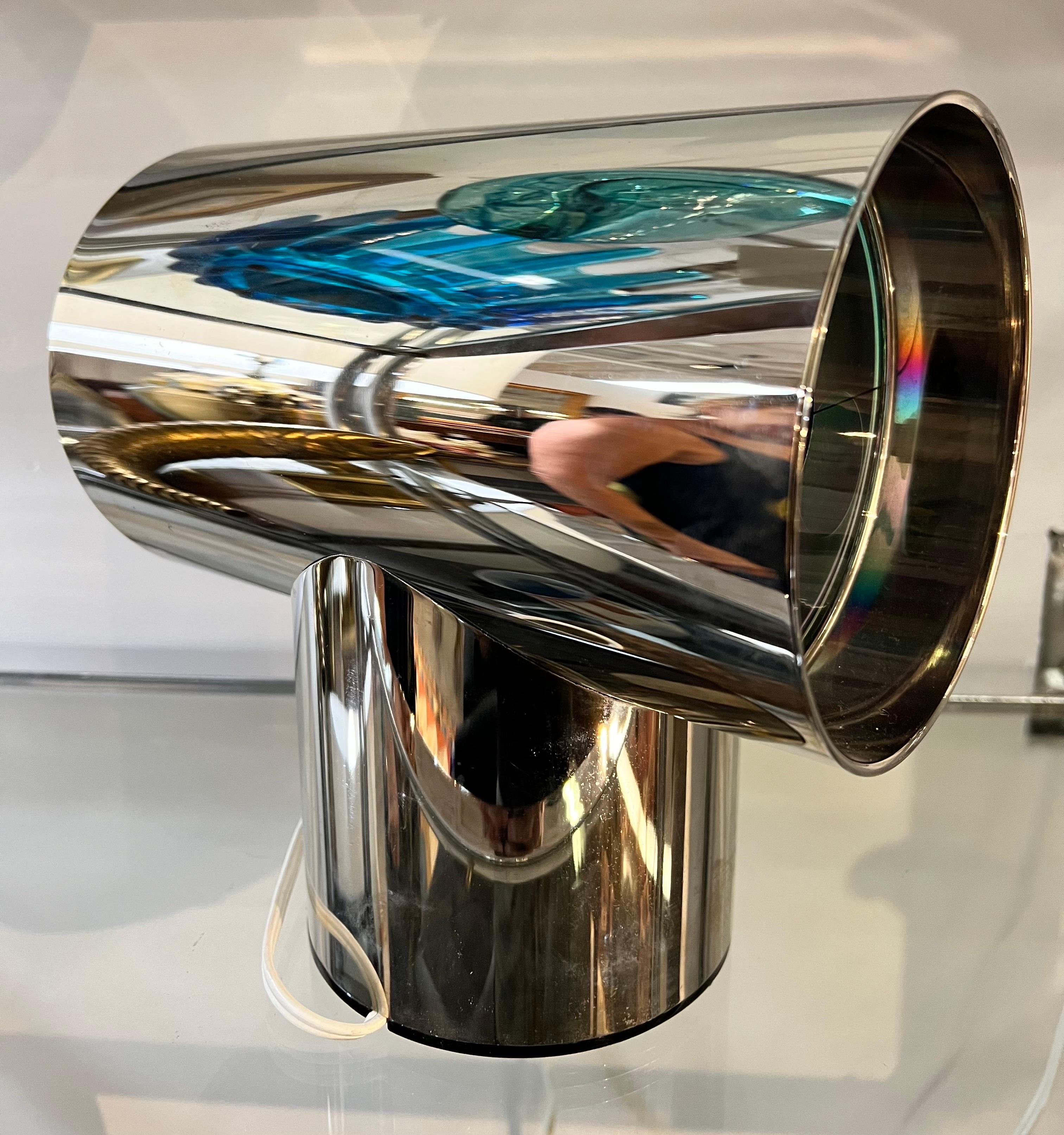 Original 1970’s vintage color shifting Aurora clock with sculpted case in highly polished aluminum. The light bulb was changed from an incandescent to a LED to protect the color filters. This model is on permanent display at MOMA starting in the