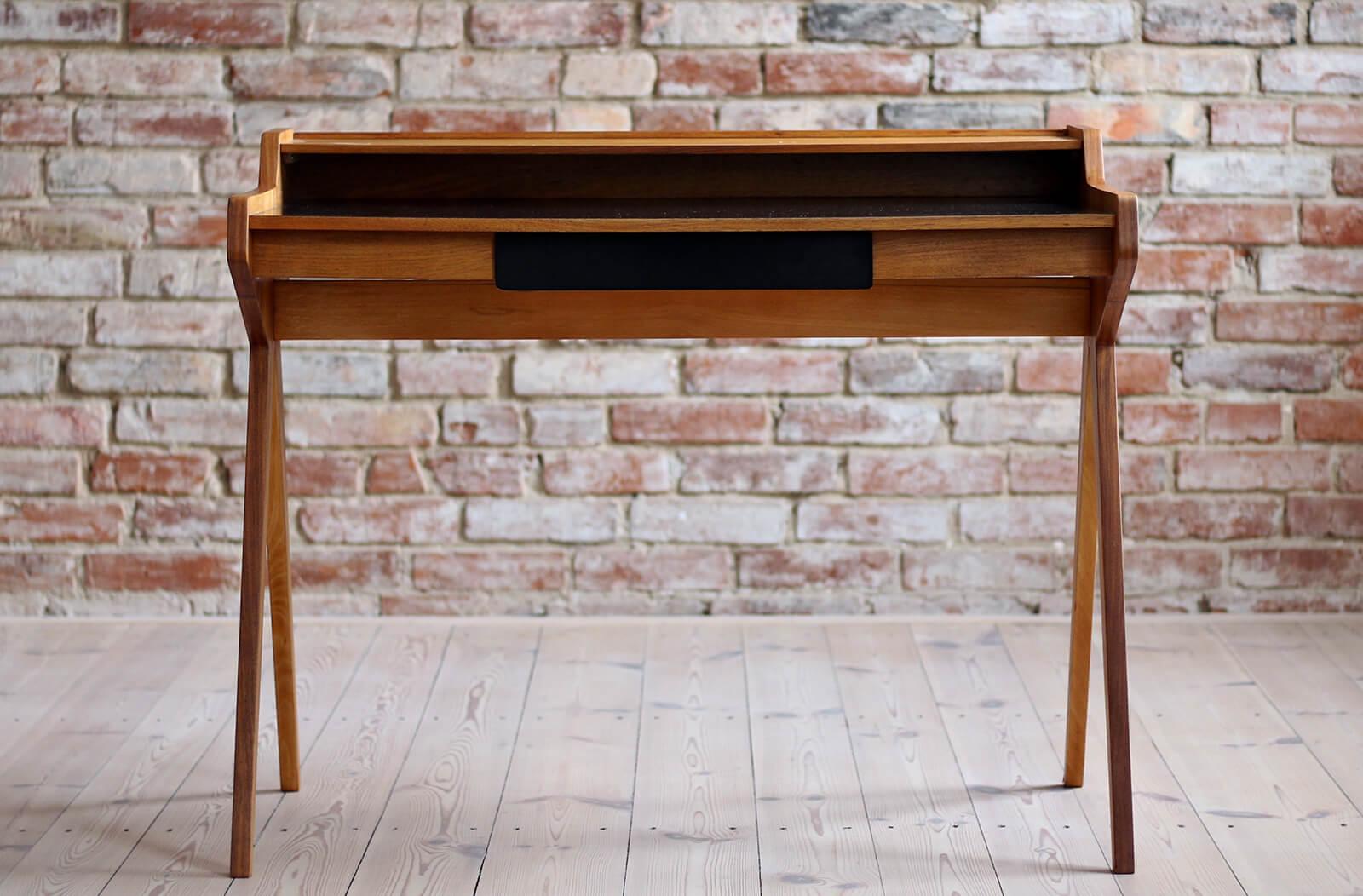 This is the famous desk designed by Helmut Magg, also known as 