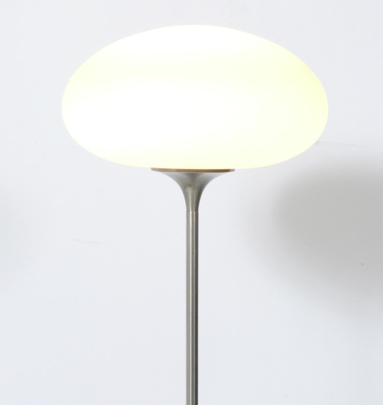 Iconic 1960s mushroom shade floor lamp, designed by Bill Curry for Laurel, American, circa 1960s. It is executed in brushed steel and retains it's original glass shade. It is rewired and ready to use.