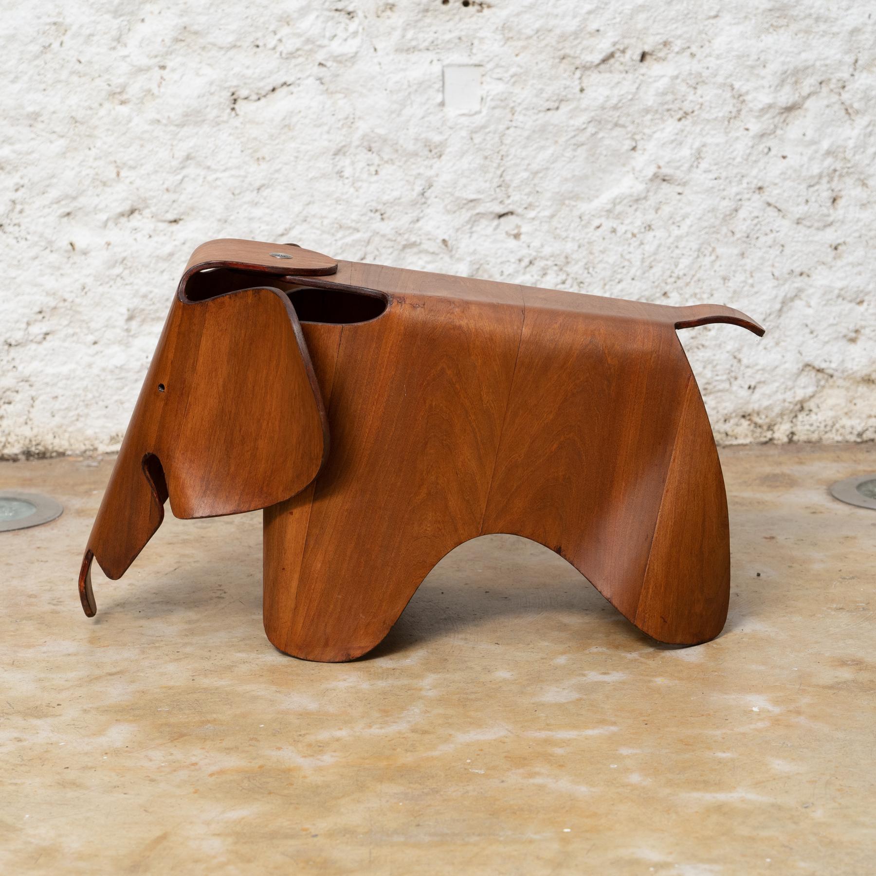 Iconic Legacy: Eames Wood Elephant Stool for Vitra, circa 2000 In Distressed Condition For Sale In Barcelona, Barcelona