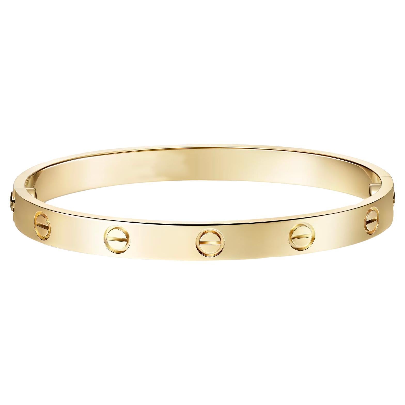 Iconic Luxury 18K Yellow Gold Bangle Bracelet For Sale