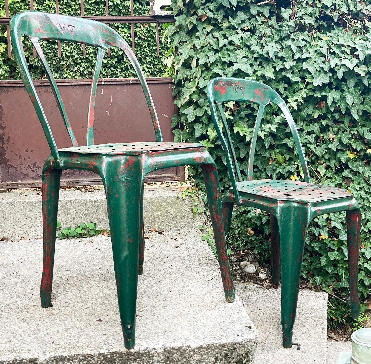 set of two 1940’s vintage Multipl’s metal dining chairs in excellent original condition. Designed by Joseph Mathieu and made in Pierre Benite in Lyon. These chairs are an iconic part of Industrial French History. Each chair was hand pressed in huge