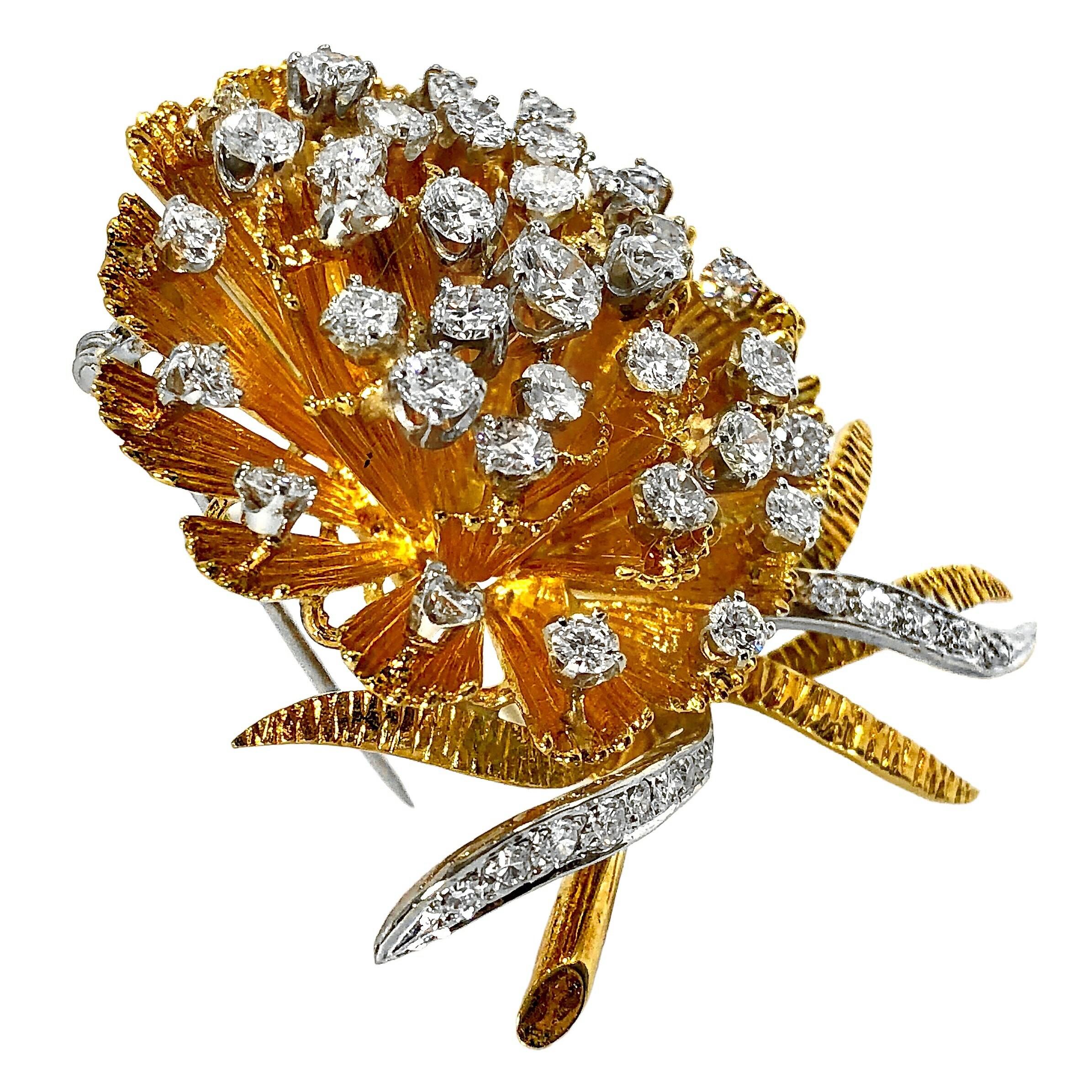 This scintillating 1960's flower cocktail brooch is unmistakably Mid-20th Century chic! With lots of hand made details, this is truly a unique and beautiful article of jewelry.  Spread across the body of the flower are numerous brilliant cut