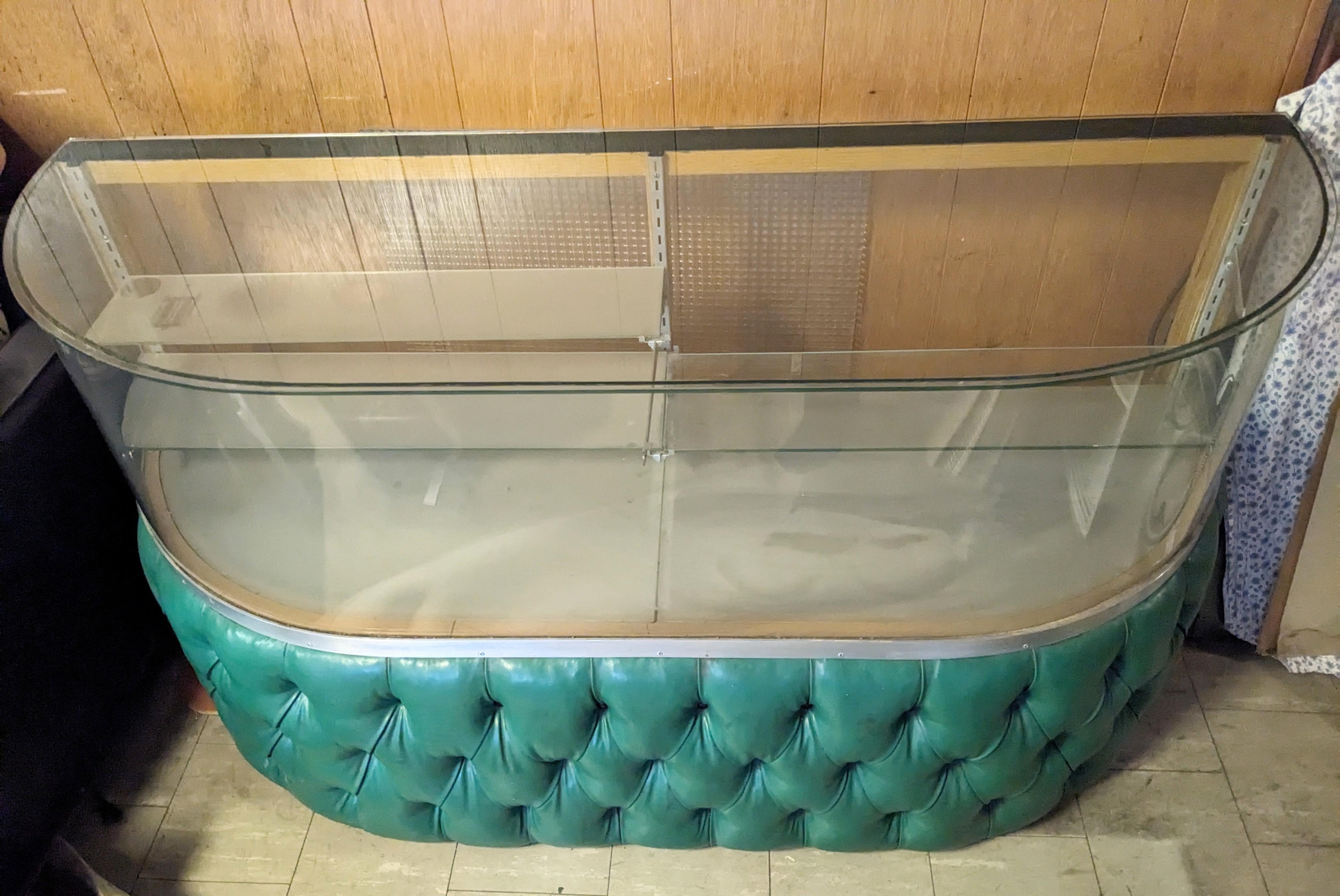 Mid-Century Modern Iconic Mid Century Curved and Tufted Vitrine For Sale