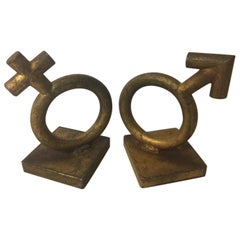 Sujetalibros icónico de mitad de siglo con símbolo de género / sexo de C. Jere