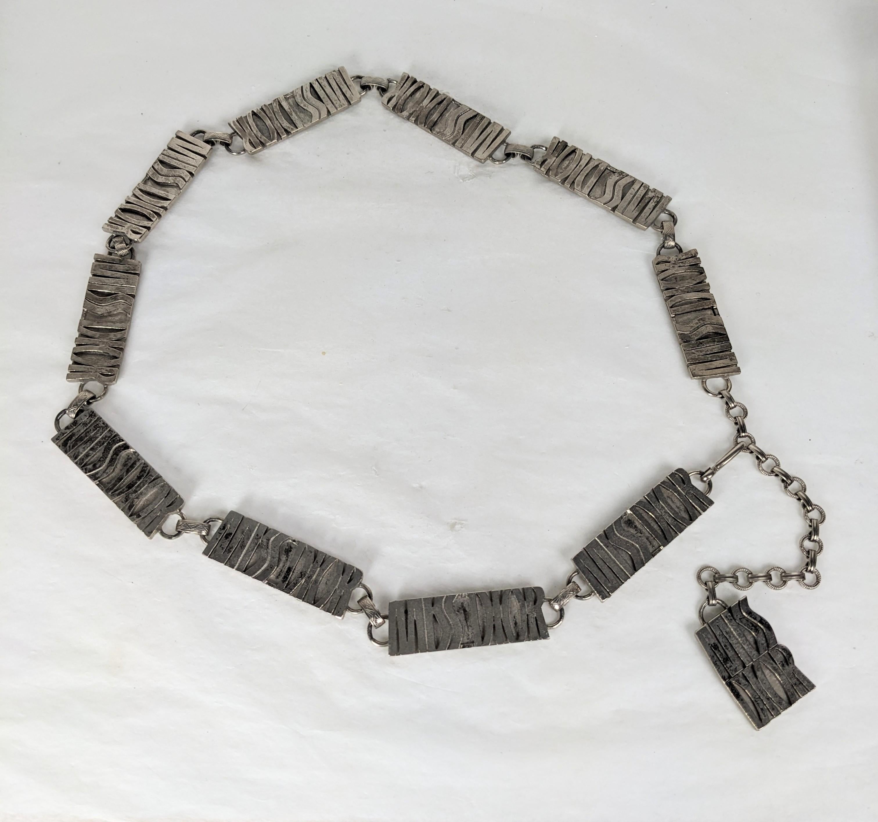 Rare Miss Dior Logo Belt, 1970's France. Antique silver plated links each embellished with Miss Dior Logo. Adjustable links for sizing. 1970s France. Fits 27
