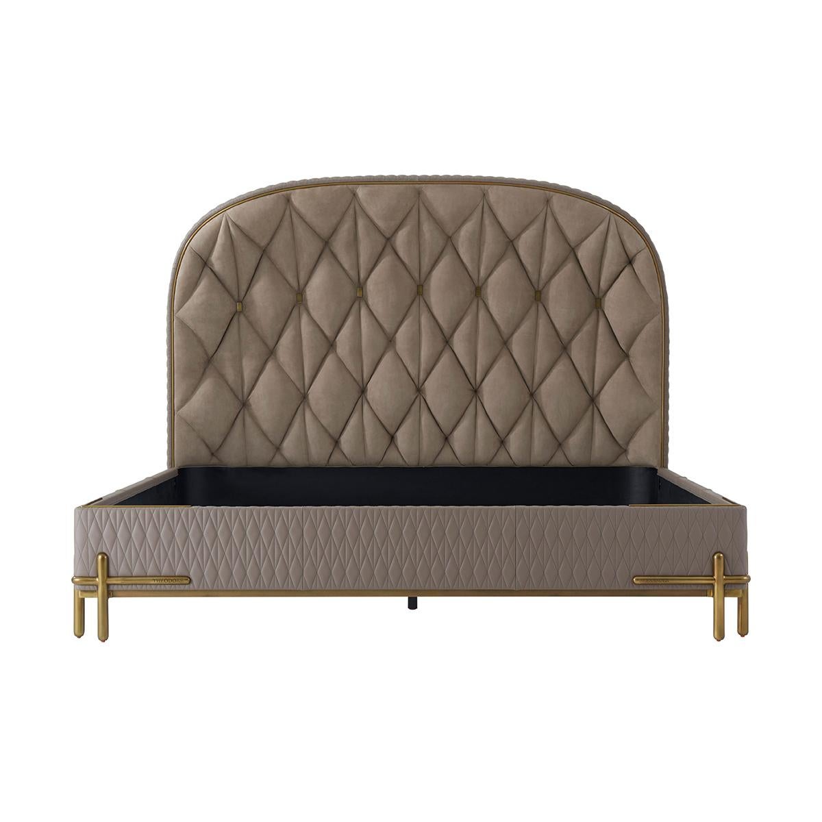 With an arched alcove geometric tufted headboard with brass finish button tufting, with quilted rails and modern batton legs and supports. 

Dimensions: 82.5