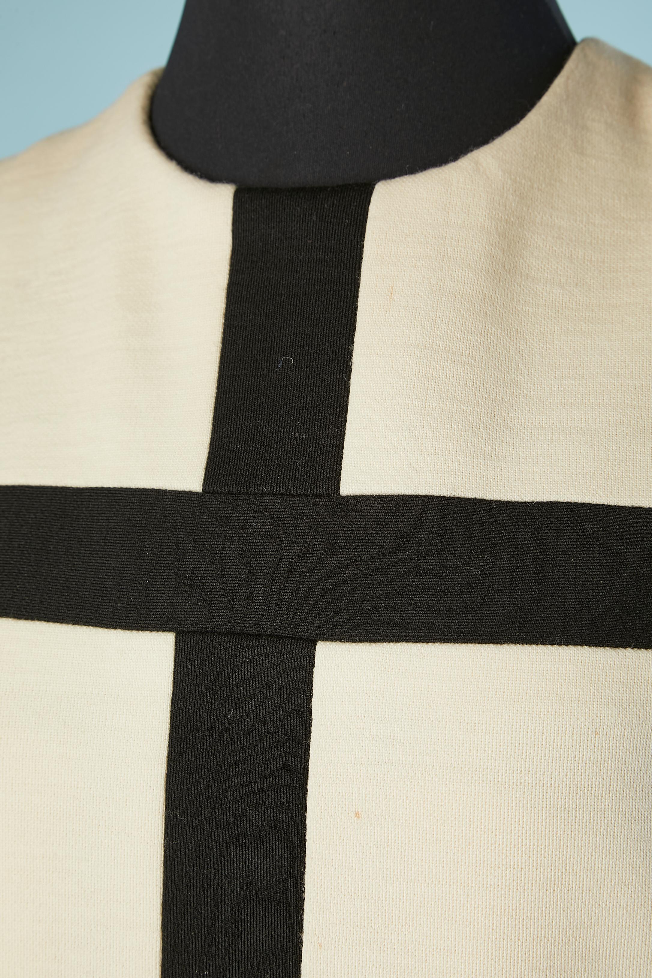 Iconic Mondrian dress in black and white wool jersey with silk satin lining. Zip in the middle back with one hook&eye on the top part. 
NO BRAND LABEL.
SIZE 40 ( 10 US) 