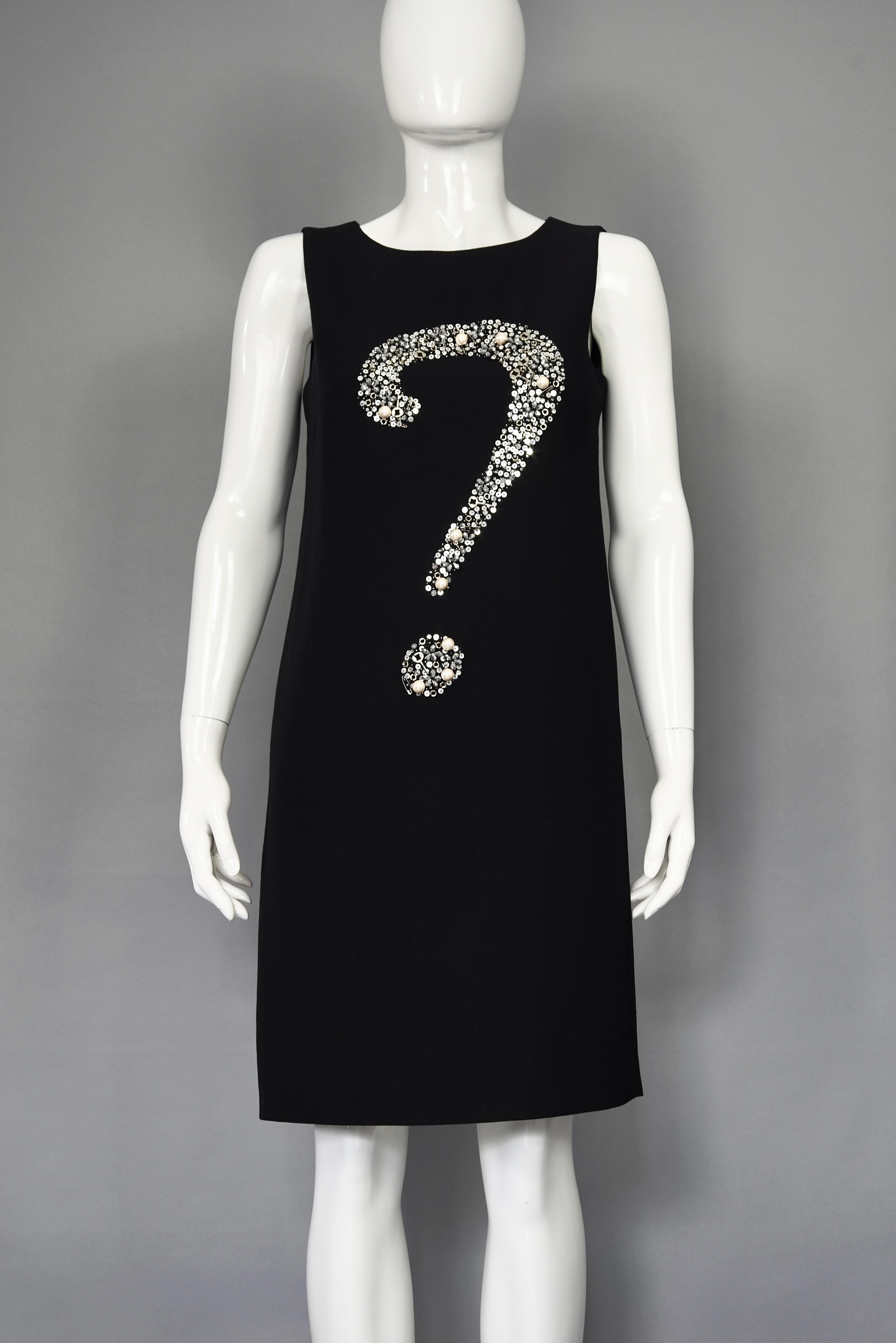 Iconic MOSCHINO Question Mark Embellished Dress

Measurements taken laid flat, please double bust, waist and hips:
Shoulder: 13.38 inches (34 cm)
Bust: 18.11 inches (46 cm)
Waist: 17.71 inches (45 cm)
Hips: 18.89 inches (48 cm)
Length: 36.61 inches