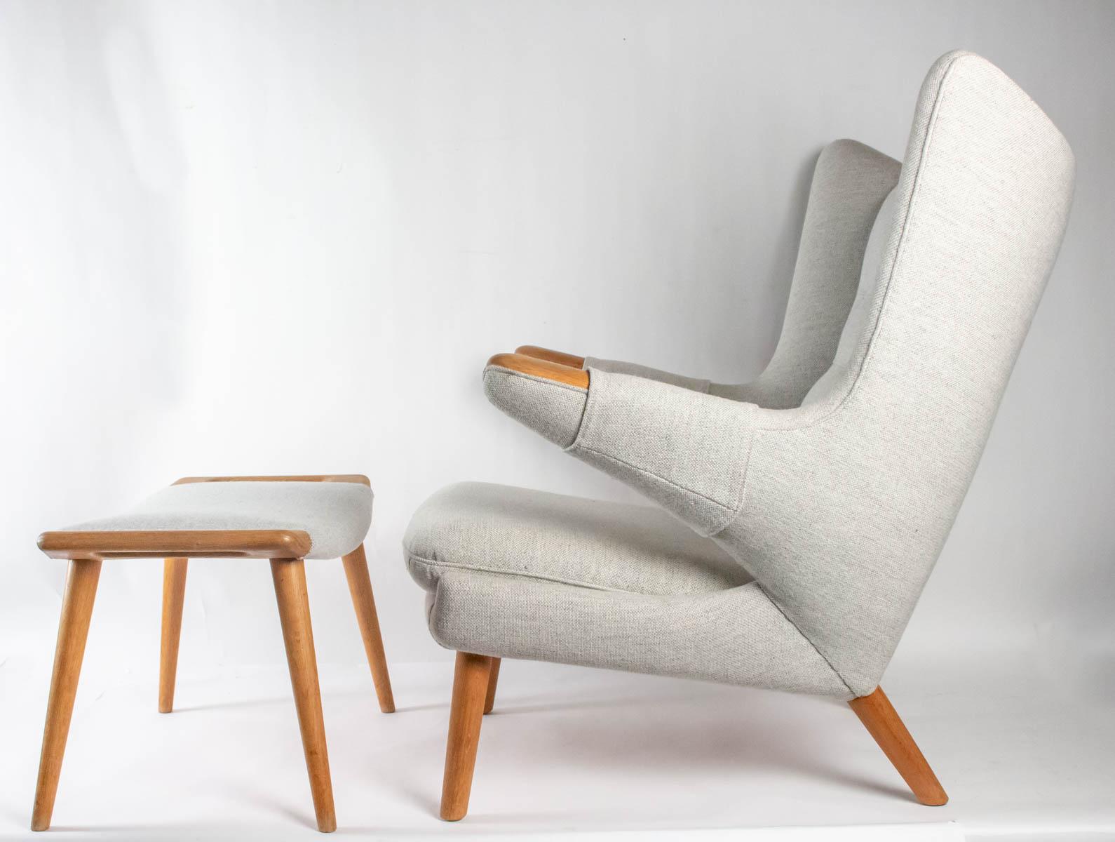 Iconic Papa Bear armchair with matching ottoman, for AP Stolen, Denmark, Hans Wegner, 1960s
Original frame 
Reupholstered in Fabric similar to original by Peer Brohl Mobelpolstring (original upholsterer)
Armchair:
Dimension: H 96 cm, D 92cm, W