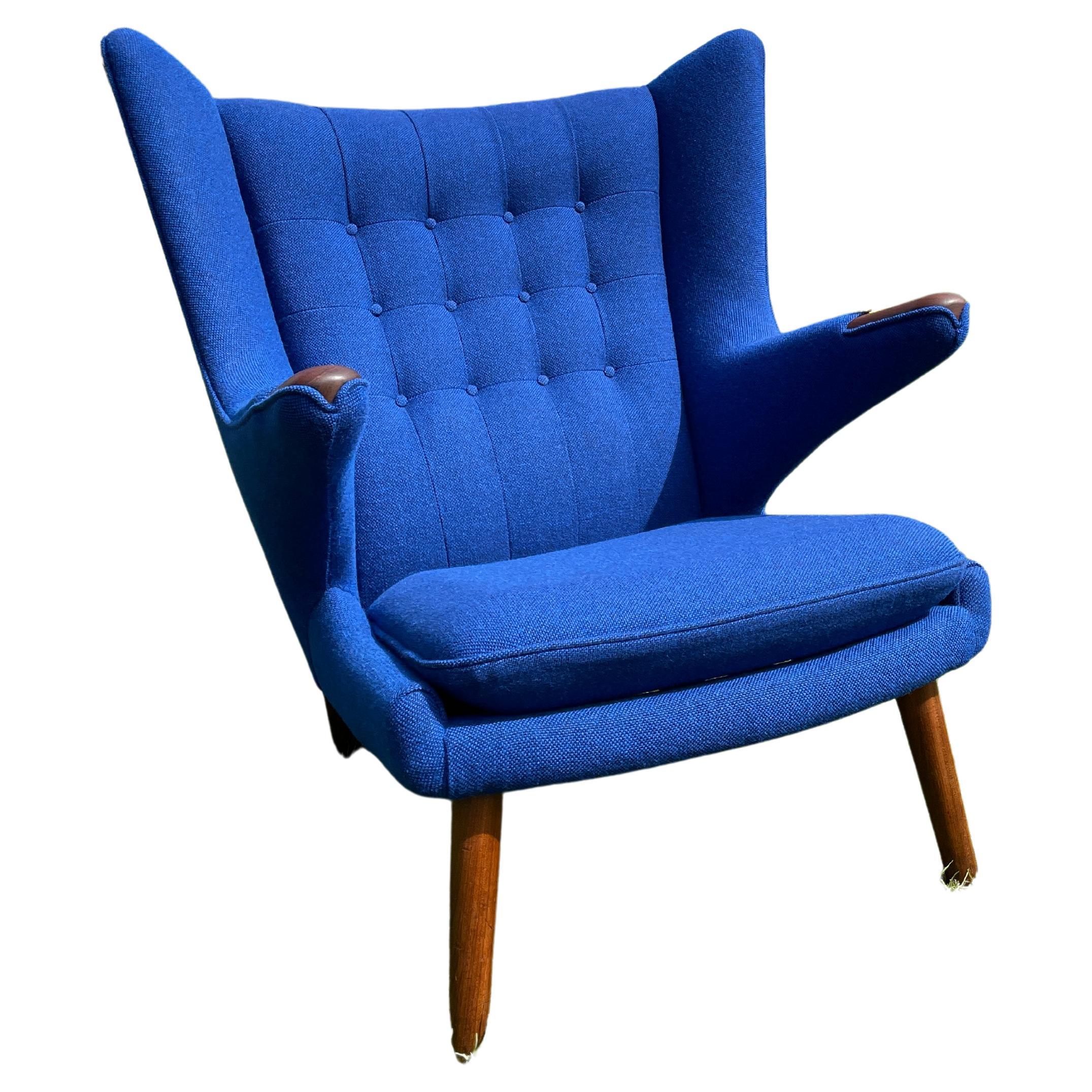 This chair is the original Papa bear chair designed and made in 50s by Hans J. Wegner and made by A.P. Mobler and has been reupholstered in very accurate way by our favourite professional upholsterer.
Fabric is Blue Kvadrat Wool, Hallingdal and has