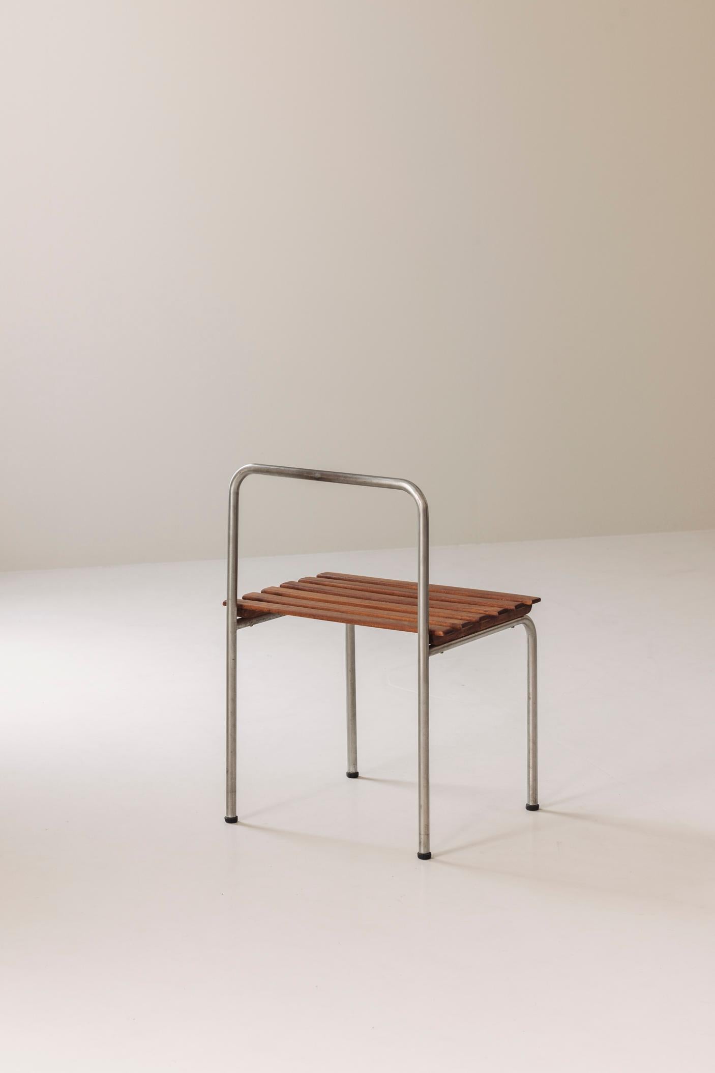 Add a touch of timeless elegance to your home with this iconic porte-bagage, designed by the legendary Charlotte Perriand for the Les Arcs resort in France in the late 1960s. Featuring a solid pine slatted support set on a tubular chrome steel base,