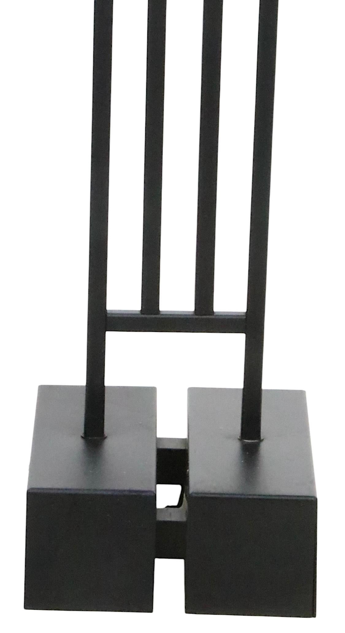 Quintessential 1980's Postmodern, Memphis School design floor lamp, in excellent, original, clean, and working condition, showing only light cosmetic wear, normal and consistent with age. Designed by George Kovacs, for Sonneman Lamps, this floor