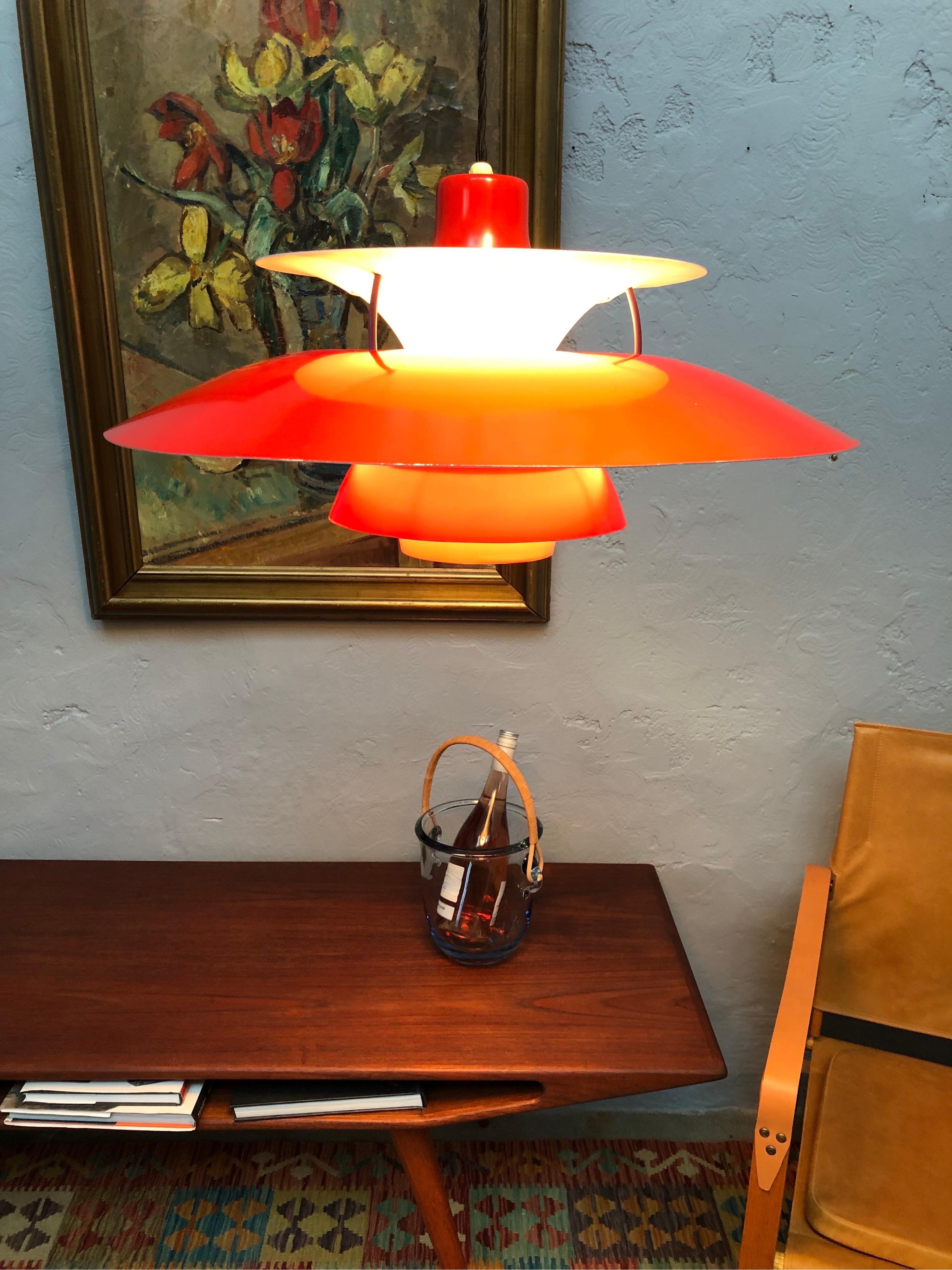 Iconic rare 1st edition vintage PH 5 chandelier pendant lamp from 1959 in red. 
Poul Henningsen designed this iconic lamp in 1958 and the launch was in September of that year at Illums Bolighus. 
This PH 5 is in great condition for its age and this