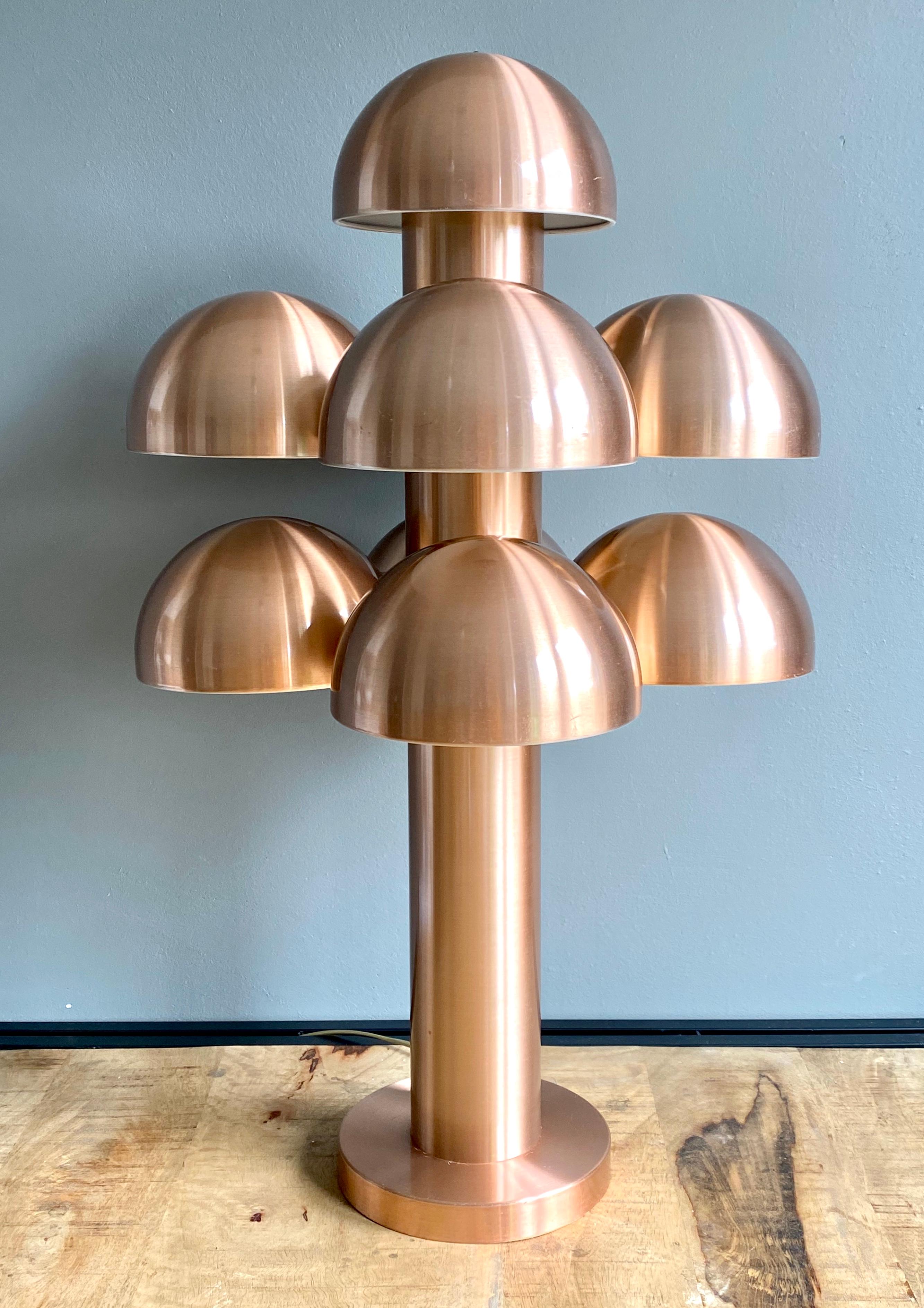 Outstanding piece with nine shades and Porselain sockets (E27). 
The Finnish Architect Maija Liisa Komulainen was obviously inspired by the Cantharelle Mushroom when she designed the piece for RAAK Amsterdam in the 1970s. It consists of anodized