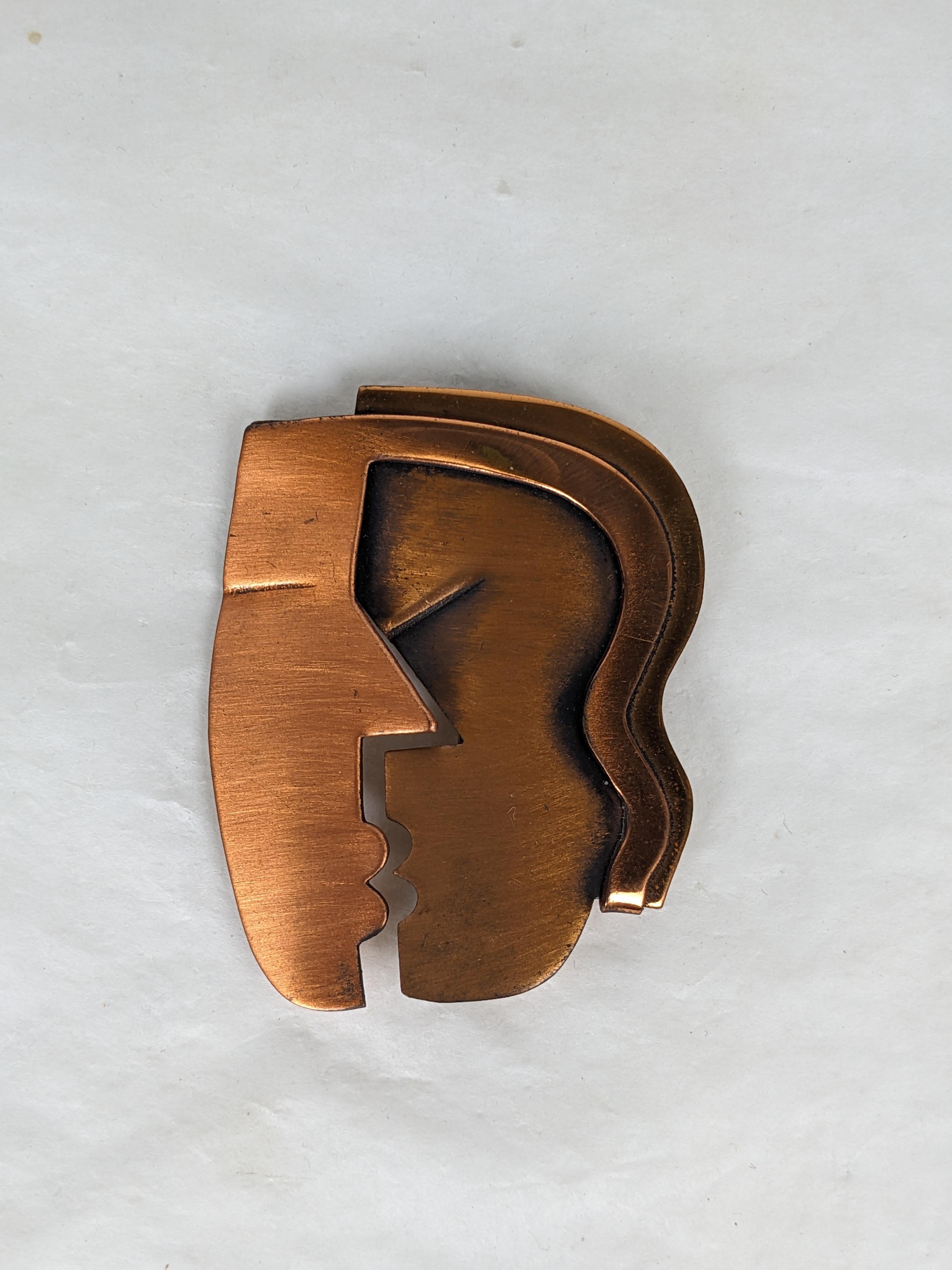 Iconic Rebajes Copper Kiss Brooch from the 1940's. Superb modernist design of copper with patina accents. 
2.25