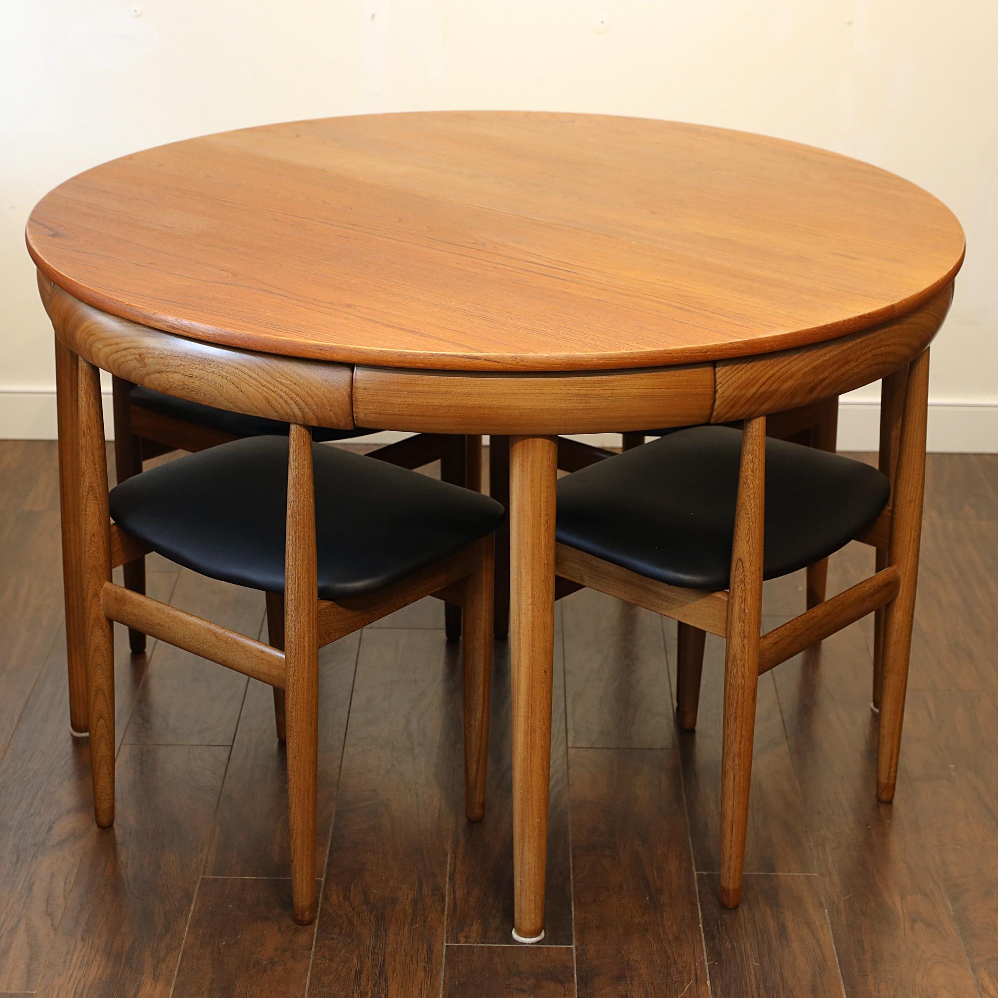 Iconic Hans Olsen dining set for Frem Rojle.
4 of 4 legged chairs and dining table set.
In Excellent Original Condition.
Table top + Folding leaf have been gently and meticulously refinished.
The middle leaf has slightly different colour to the