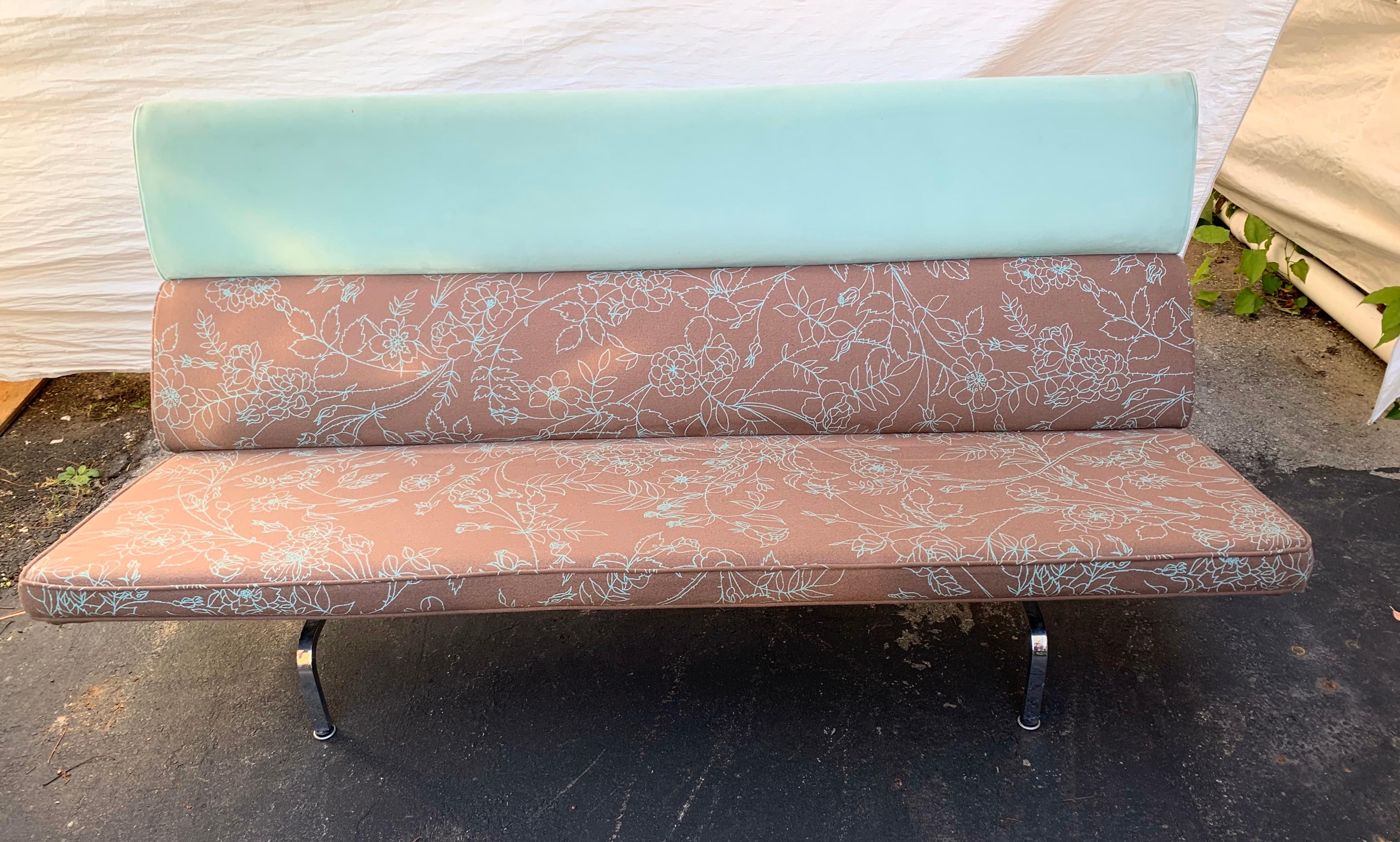The signed, iconic, clean-lined sofa design by Charles and Ray Eames upholstered in a wonderful whimsical fabric. This piece comes from the Avon Corporation headquarters in Rye, NY.