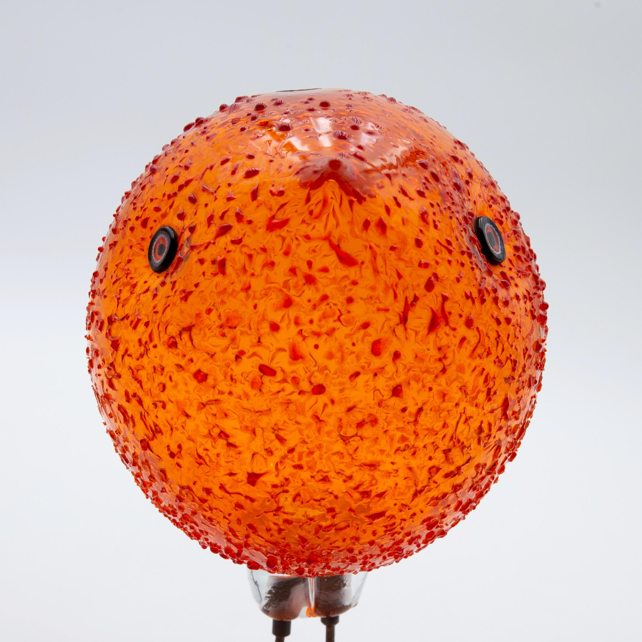 Blown textured glass sculpture, with applied murrine glass eyes supported on copper legs.
This iconic bird has been designed by Alessandro Pianon for Vetreria Vistosi in Murano in 1962.

Similar examples are exhibited: 
The Museum Of Fine Arts -
