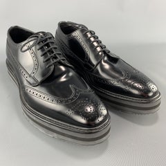 Iconic Spring Summer 2011 Collection PRADA brogues come in burgundy and tan brow