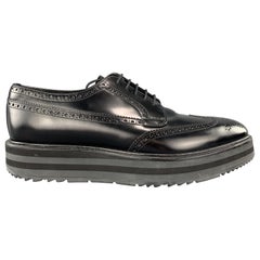 Iconic Spring Summer 2011 Collection PRADA brogues come in burgundy and tan brow