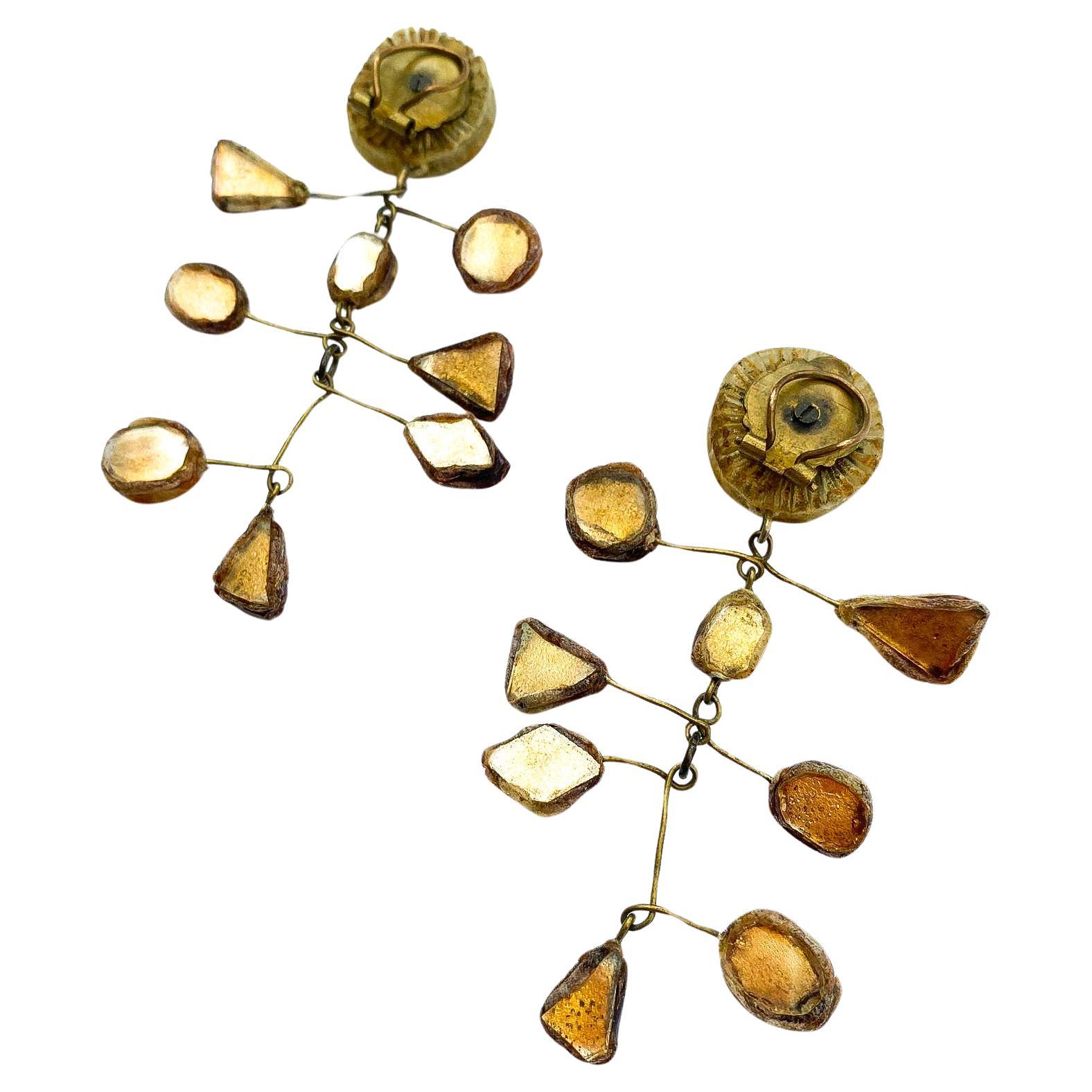 A pair of exquisite and very distinctive drop earrings by Line Vautrin. created in her later period when she was experimenting with fragments of coloured mirror and Talousel. This design is called 'Mobile', named in homage to Alexander Calder and
