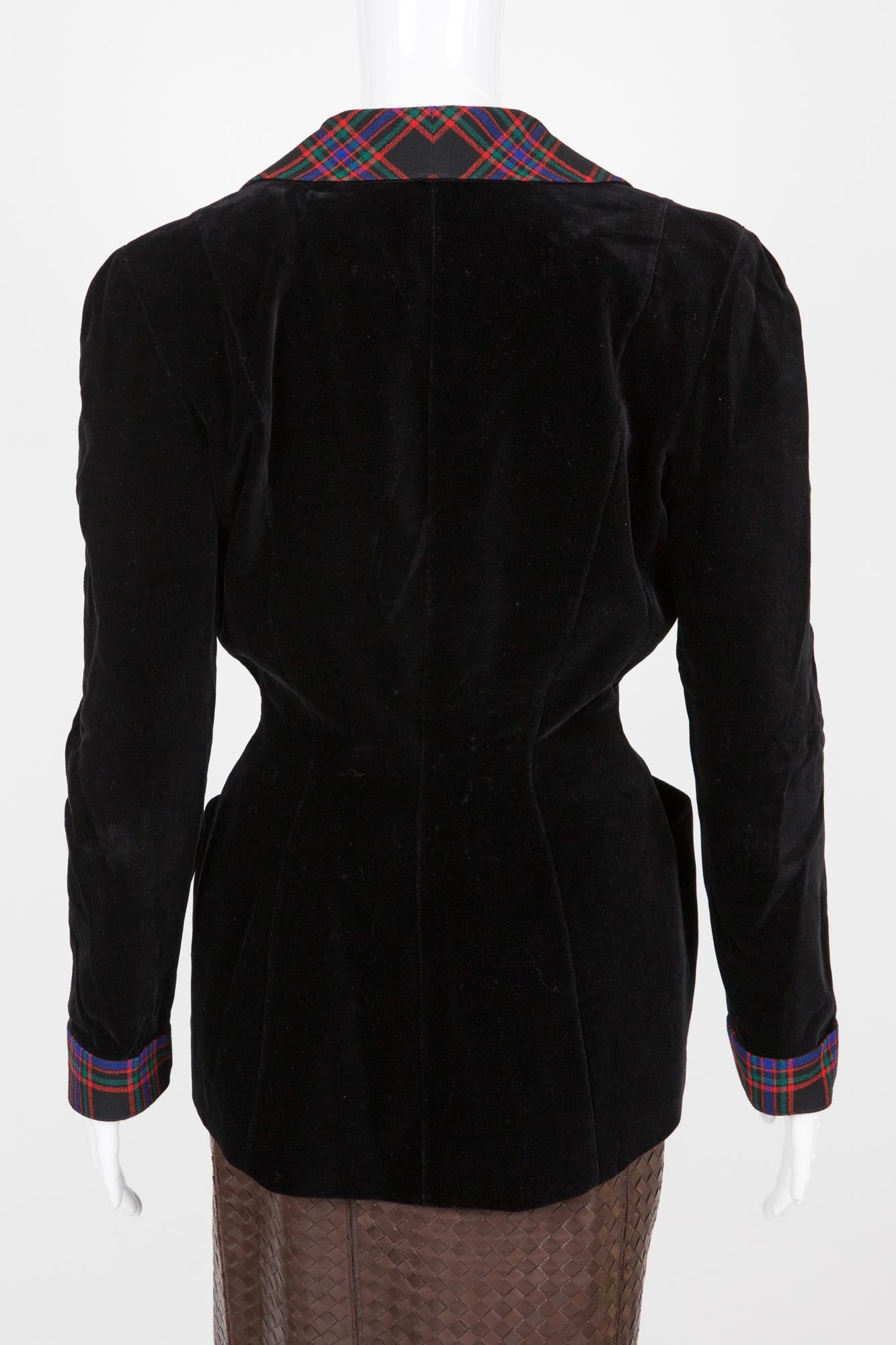 Thierry Mugler black cotton velvet  jacket featuring a contrasted Tartan wool collar, Tartan cuffs, velvet buttons opening, longer at back.
Circa: 1980s
Velvet: Cotton 100%
Tartan details: wool 100%
In good vintage condition. 
Made in France.