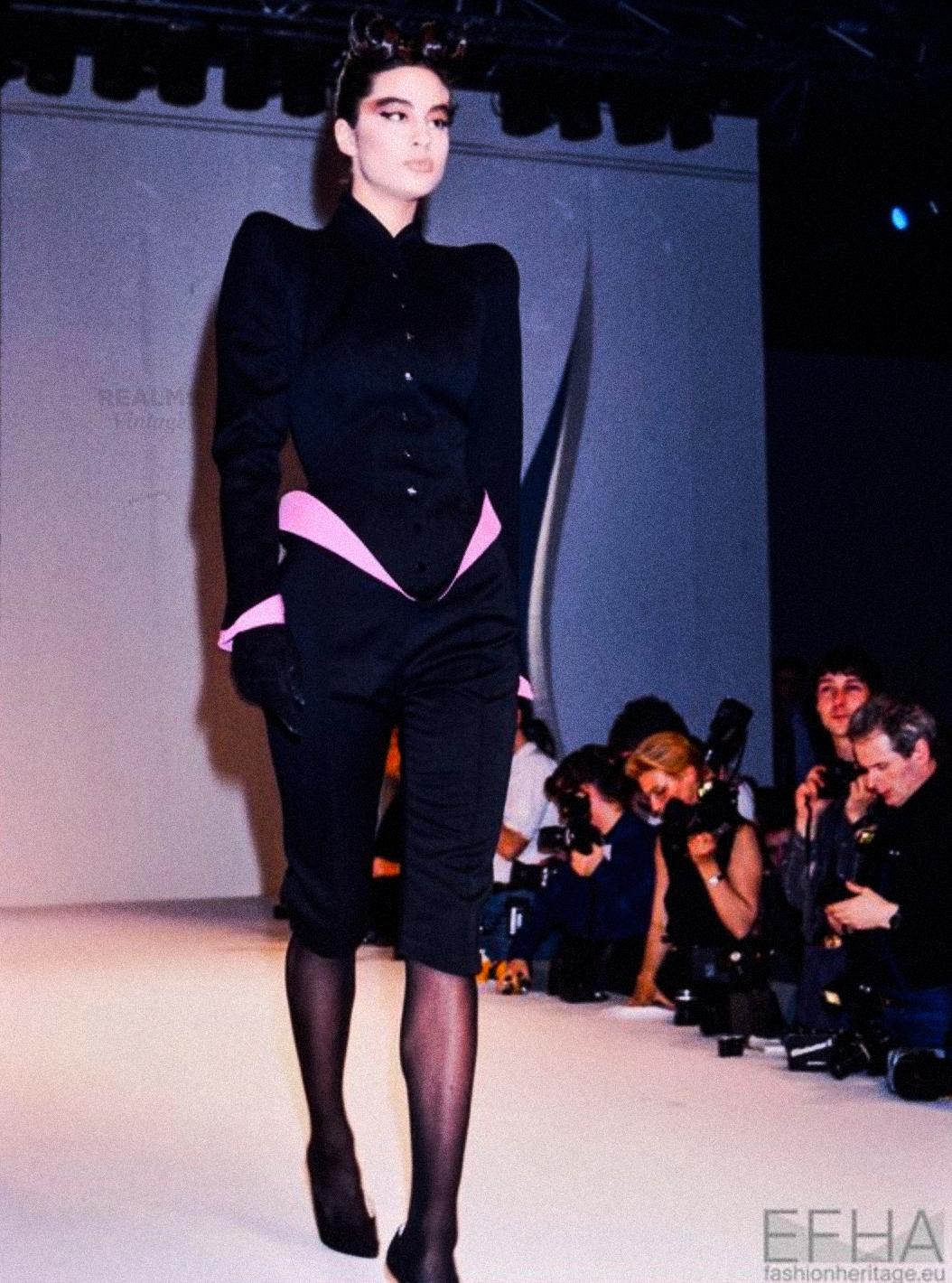 Museum worthy piece of Fashion History

The stunning iconic Thierry Mugler creation from the legendary Les Infernales (SHE DEVILS) Collection FW 1988/1989. Extremely rare documented Runway piece.
Powerful sculptural shape.
Dramatic avant-garde