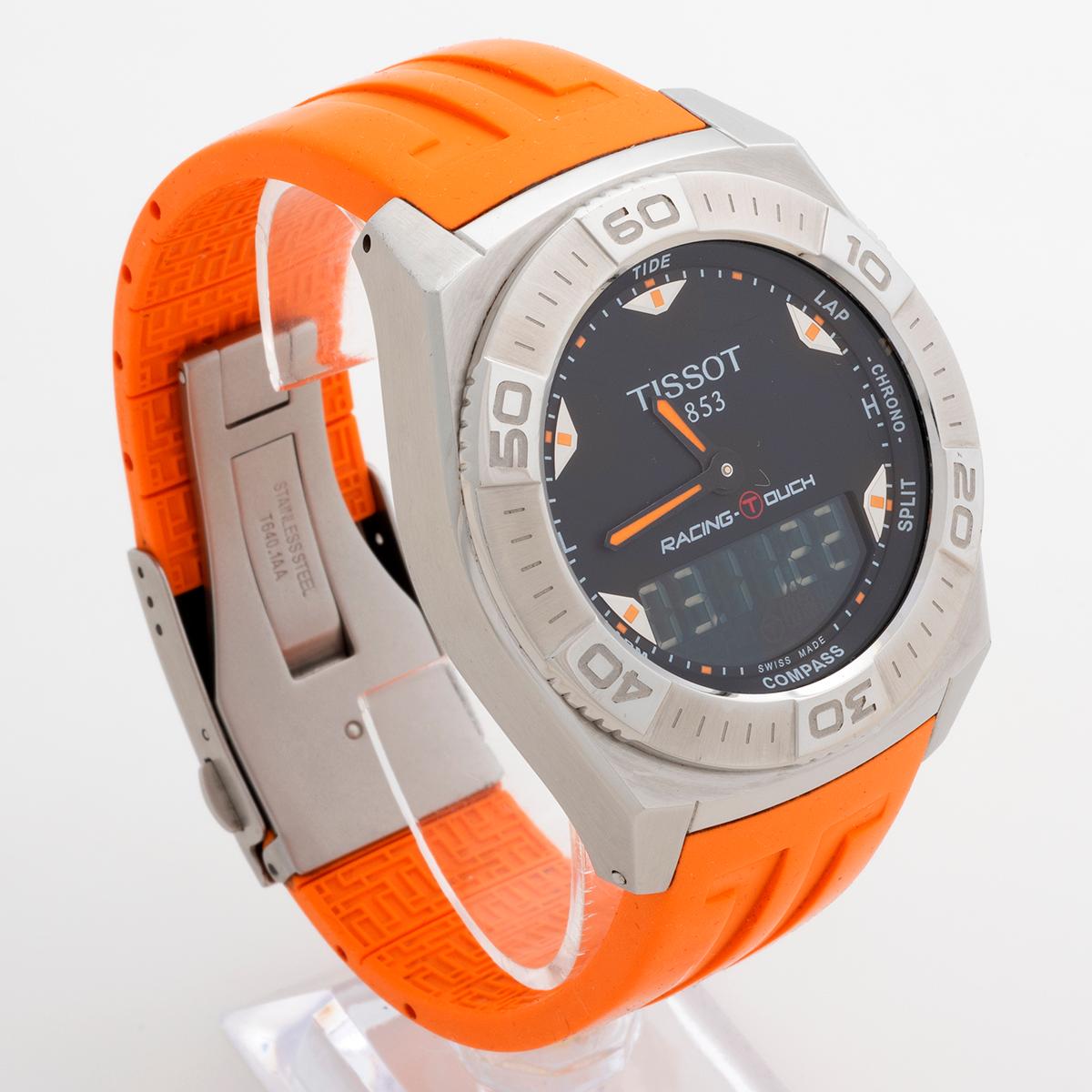 Our iconic Tissot T Touch Racing features a 40mm steel case with black / orange dial and orange rubber strap with steel clasp. This version of reference T002520A is discontinued and was made famous as regularly worn by Top Gear / Grand Tour