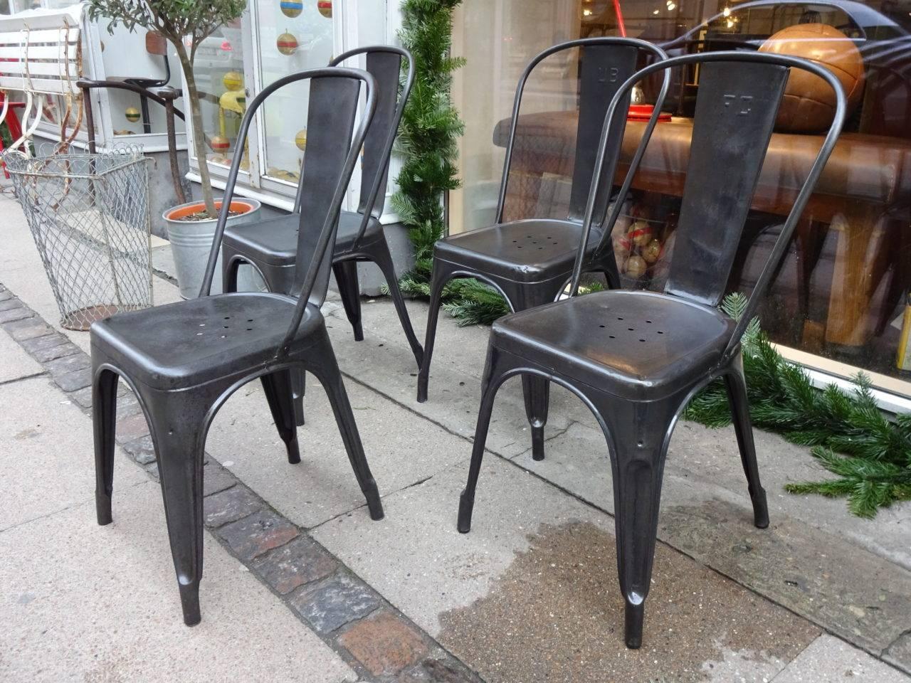 Fabulous vintage French metal Tolix chairs, designed by Xavier Pouchard. Produced since 1934, they are also displayed at New York’s MoMA and the Centre Pompidou in Paris. Appears in treated and polished iron. Super patina.