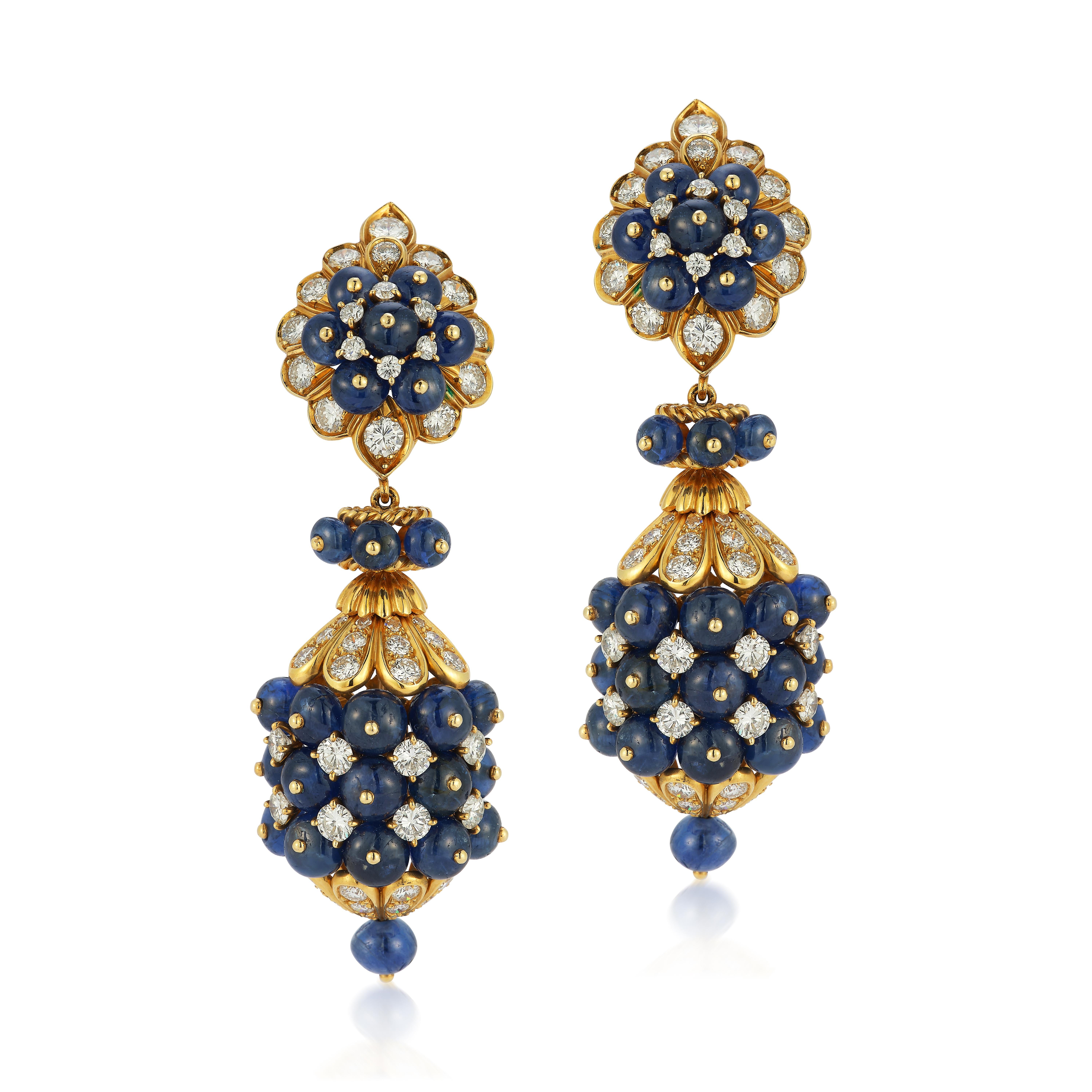 Van Cleef and Arpels Day and Night Sapphire Earrings - A pair of 18 karat gold earrings set with sapphire beads and approximately 6.1 carats of round and single cut diamonds. The pendants are detachable allowing the earrings to be worn two different