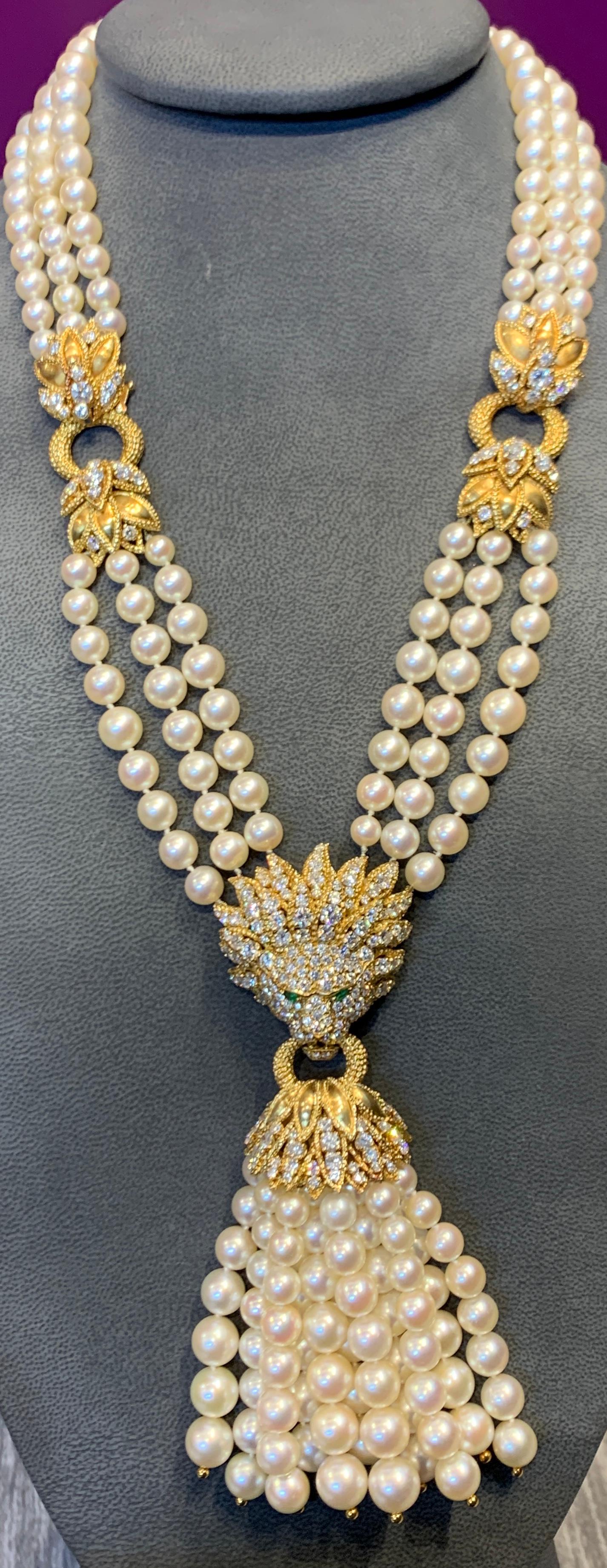 Van Cleef & Arpels Pearl & Diamond Lion Necklace, Earrings & Ring Set, 18K Yellow Gold.

A Cultured Pearl tassel necklace with pearls measuring 8.7 to 6.2 mm including diamond & textured gold links of foliate motif, with 11 tassels of cultured