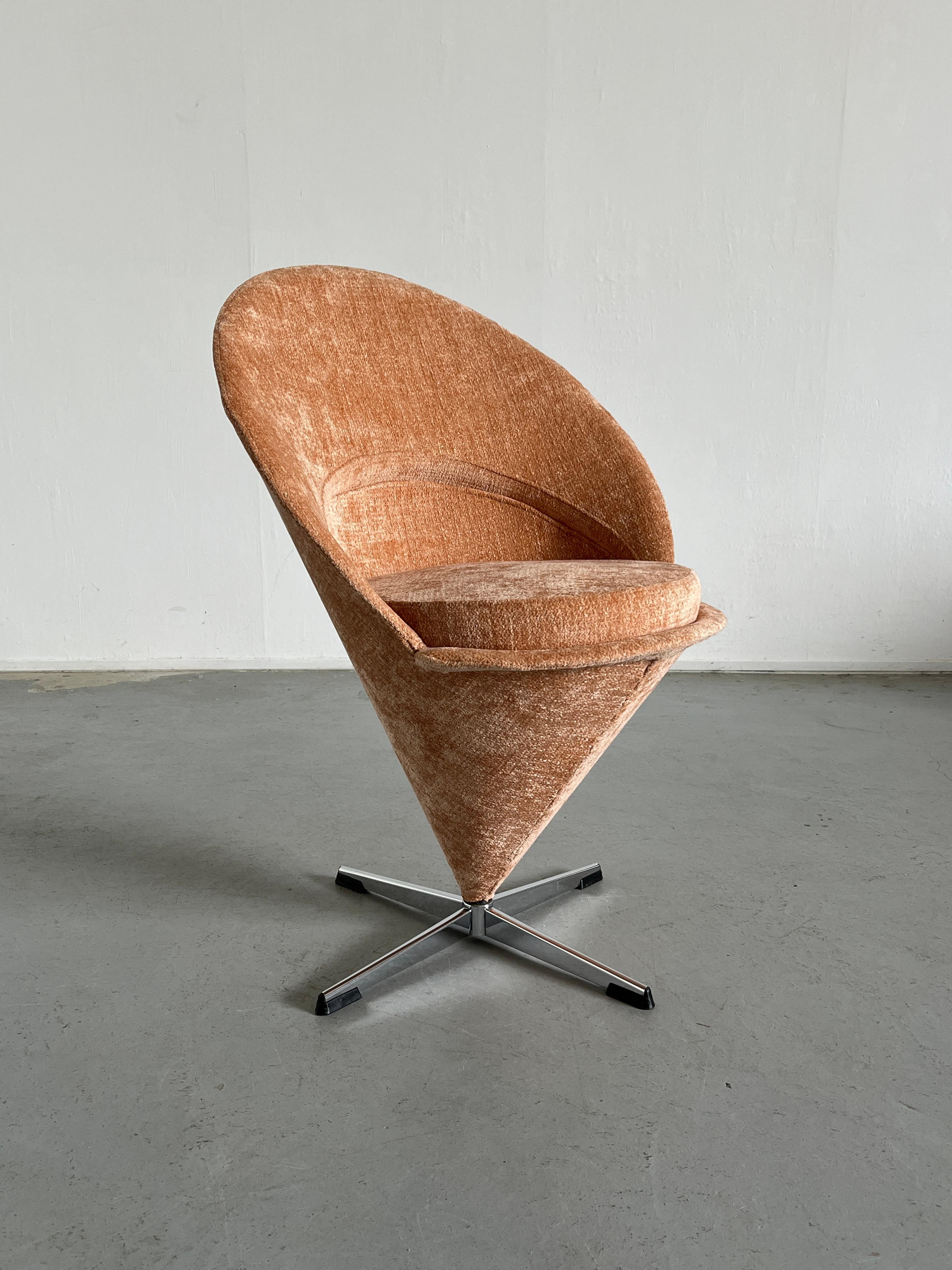 One of the most popular design icons, the Cone chair designed by Verner Panton in 1958, originally created as part of a complete redesign of the Kom Igen restaurant's interior. The armchair owes its name to its simple, conical shape with graceful