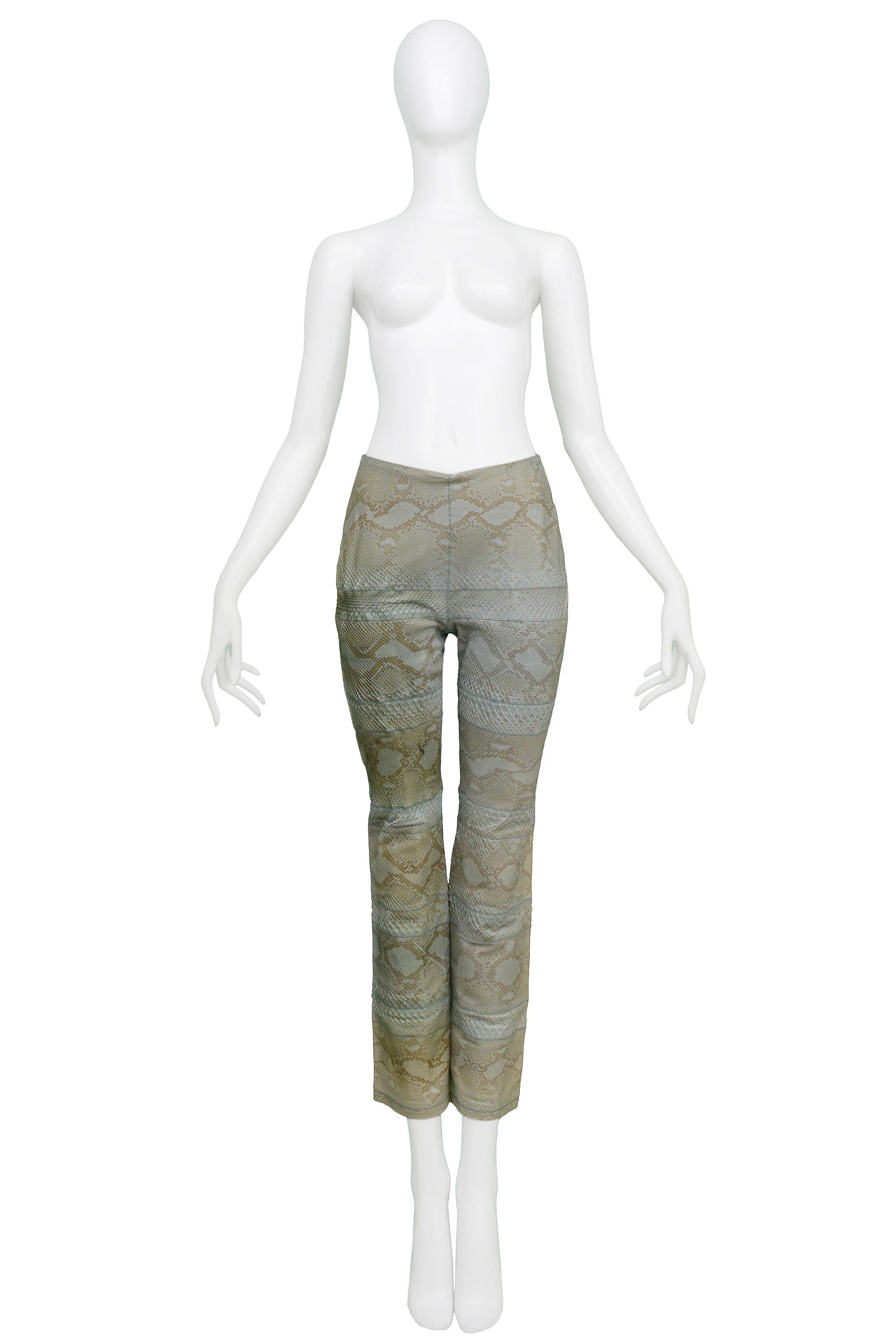 Resurrection Vintage is excited to offer a pair of vintage Versace Couture light blue python leather pants featuring a high-waist, slim fit, skinny legs, paneling, blue stitching, light blue lining, and center back zipper. 

Versace
Size 38
100%