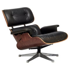 Iconic Vintage Eames Lounge Chair in Leather and Cherrywood 