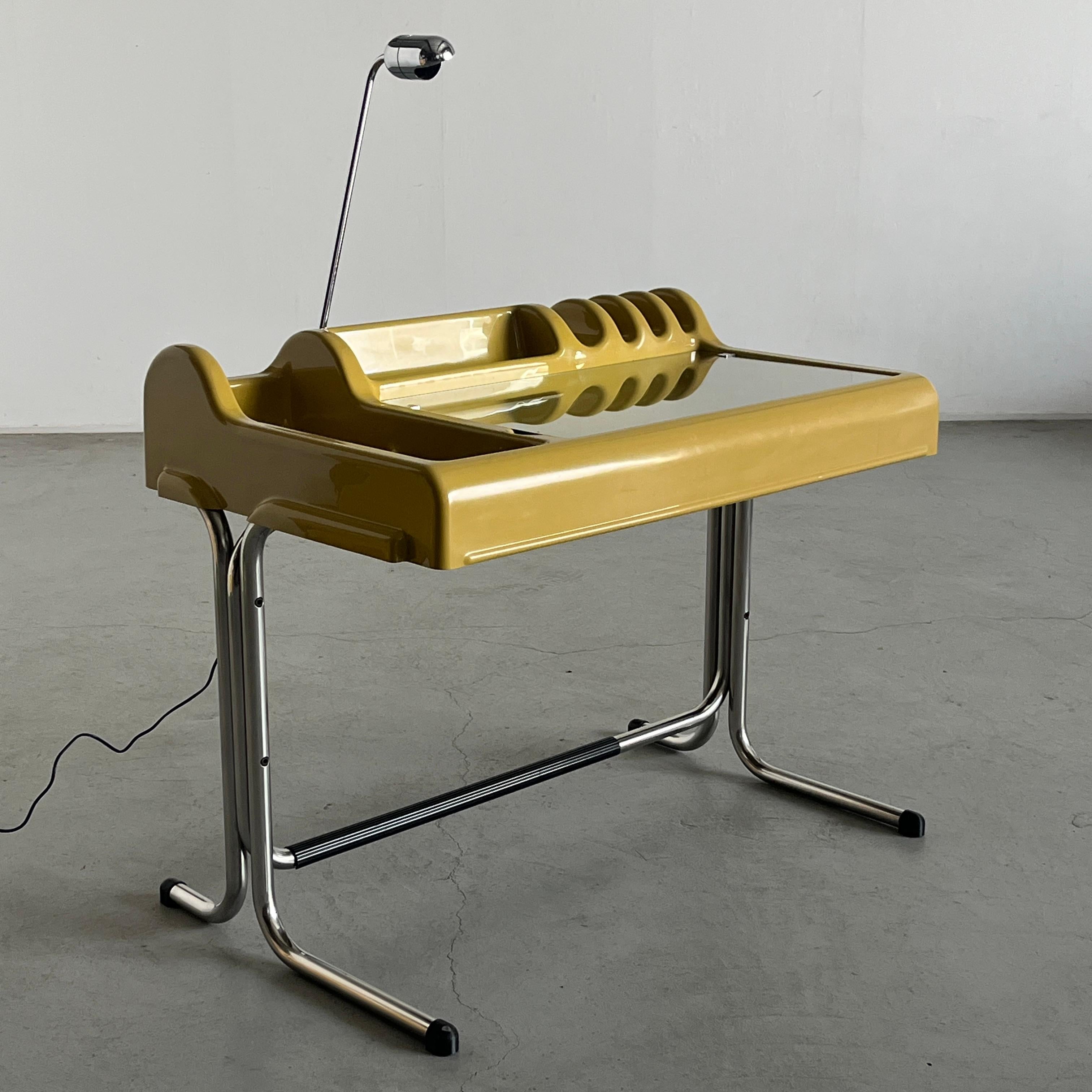 Iconic and instantly recognizable ‘Orix’ desk designed by Vittorio Parigi and nani Prina for Molteni & Co in 1971.

Seen here in its most beautiful colourway (according to us), a lovely mustard yellow.
The desk allows for truly intuitive and
