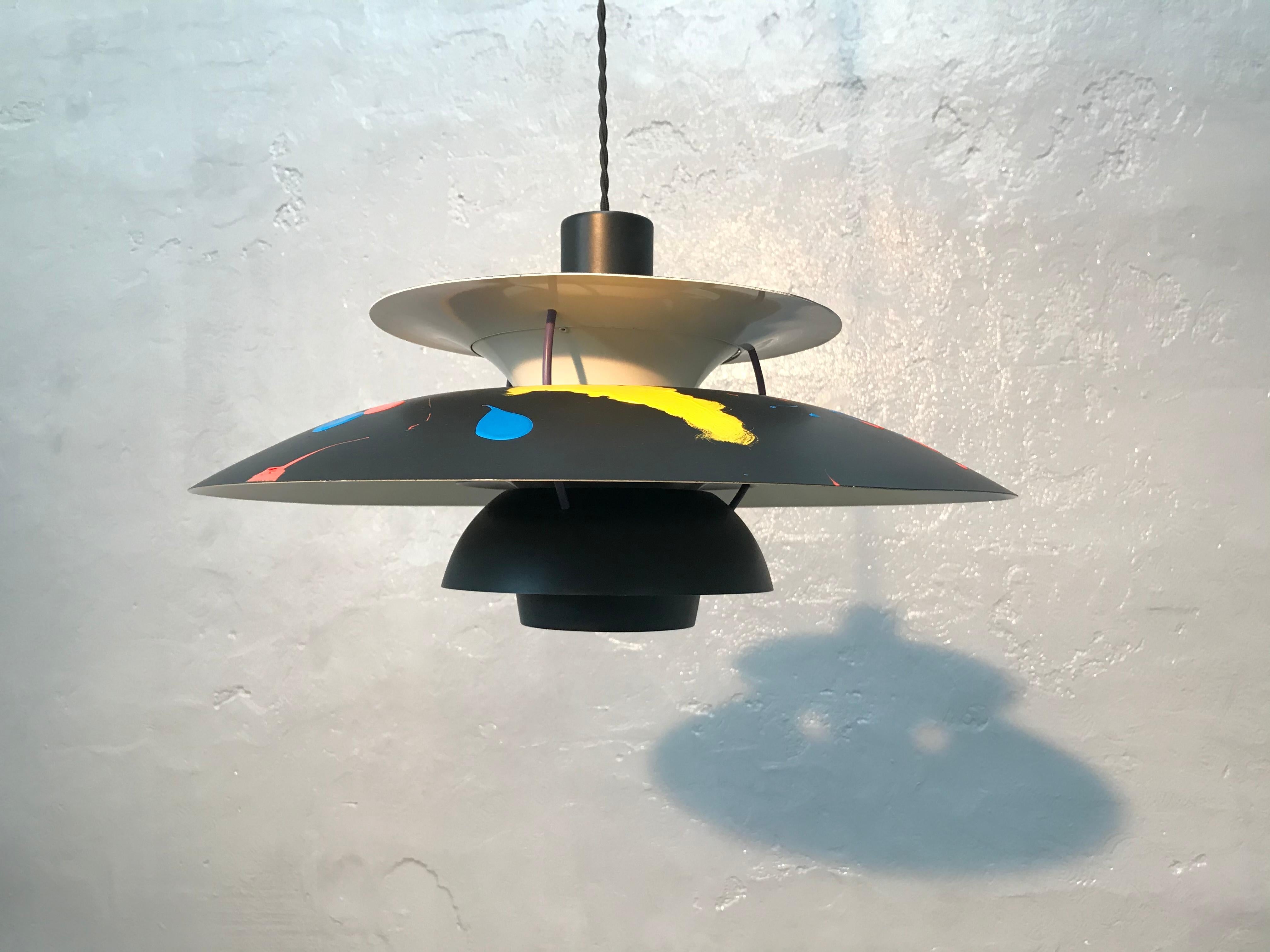 Iconic vintage PH5 chandelier by Poul Henningsen for Louis Poulsen of Denmark in satin black finish and decorated with modernist art work.
The art work is acrylic paint with a clear coat finish on top.
Each lamp is unique.
 