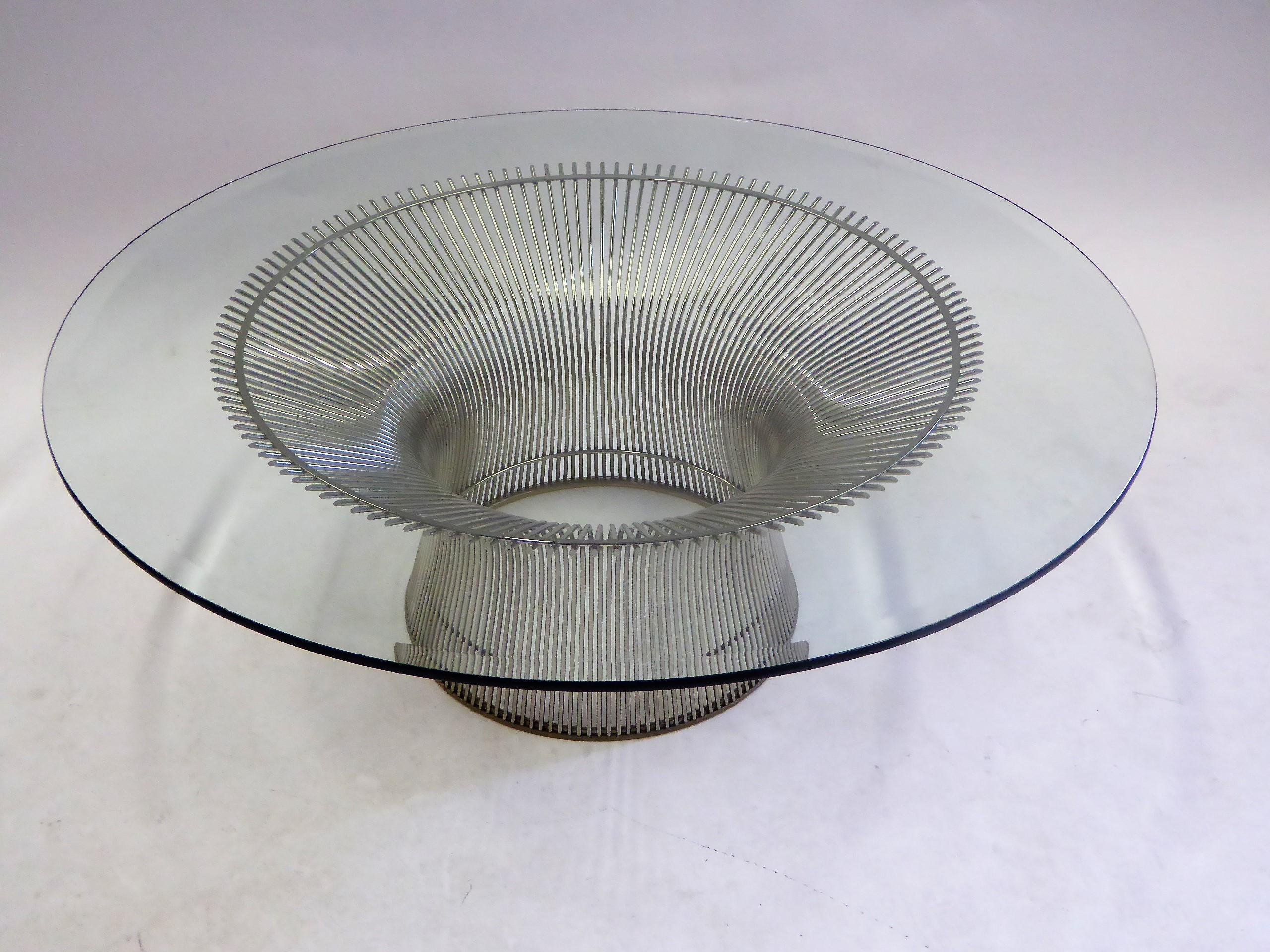 From the Warren Platner collection for Knoll, his unique design from 1966, is this nickeled steel table of upsweeping rods creating a fountain like form topped with the larger choice 42 inch bevelled edge glass. Magnificent coffee table, always a