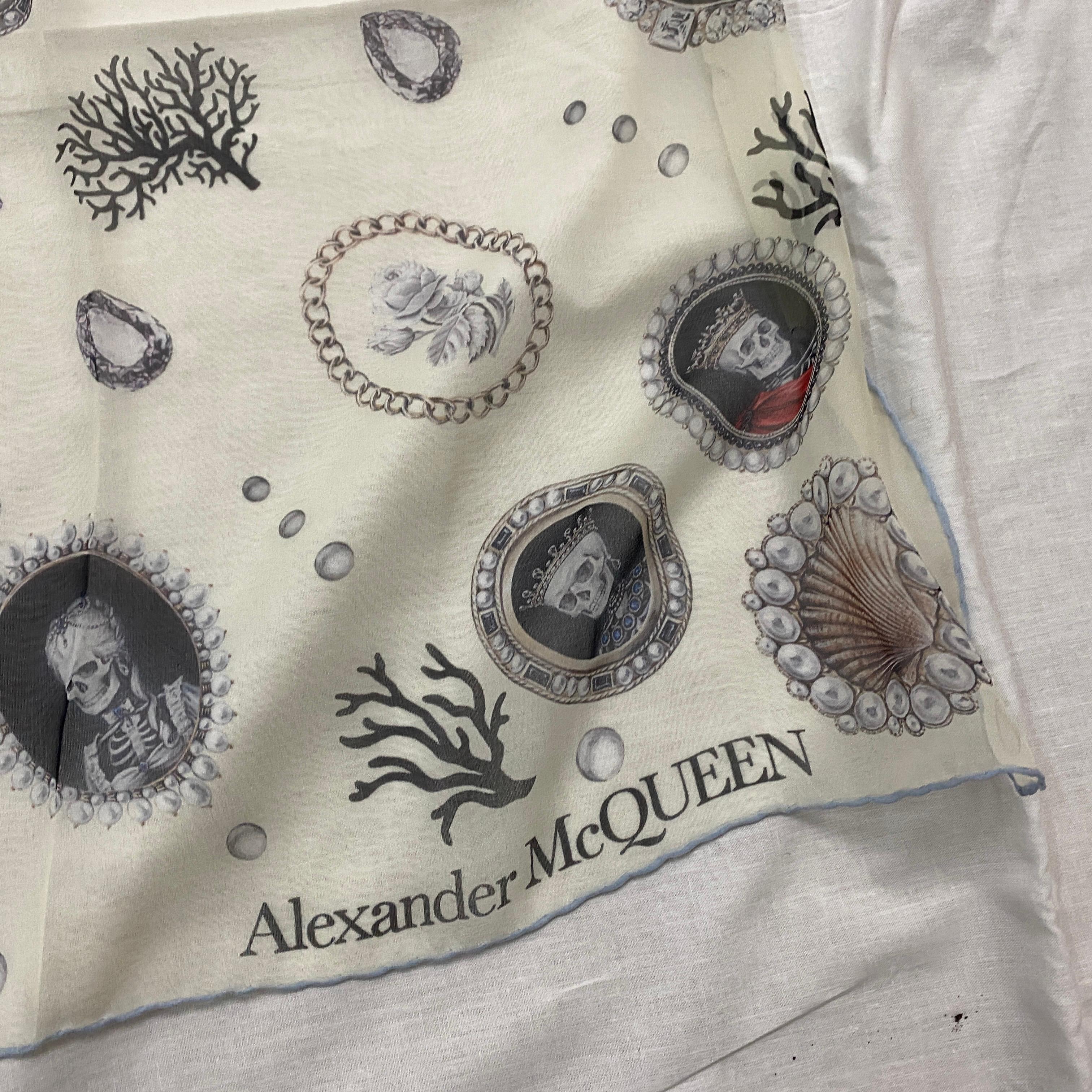 Iconic White Silk Scarf by Alexander McQueen, with central Skull and other shell and coral designs. Dimensions 135 x 135 cm.