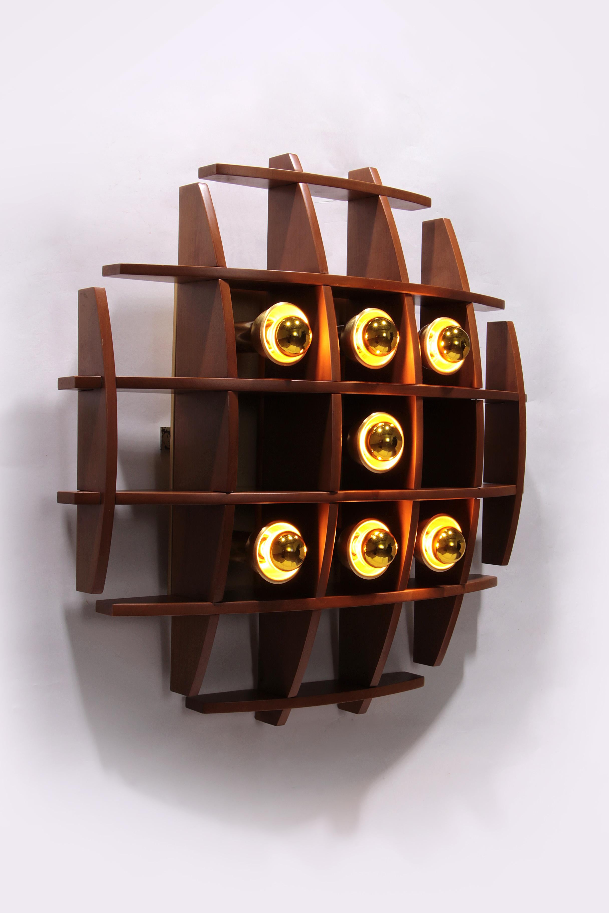 Italian Iconic Wooden wall lamp by Angelo Brotto, 1960s design For Sale
